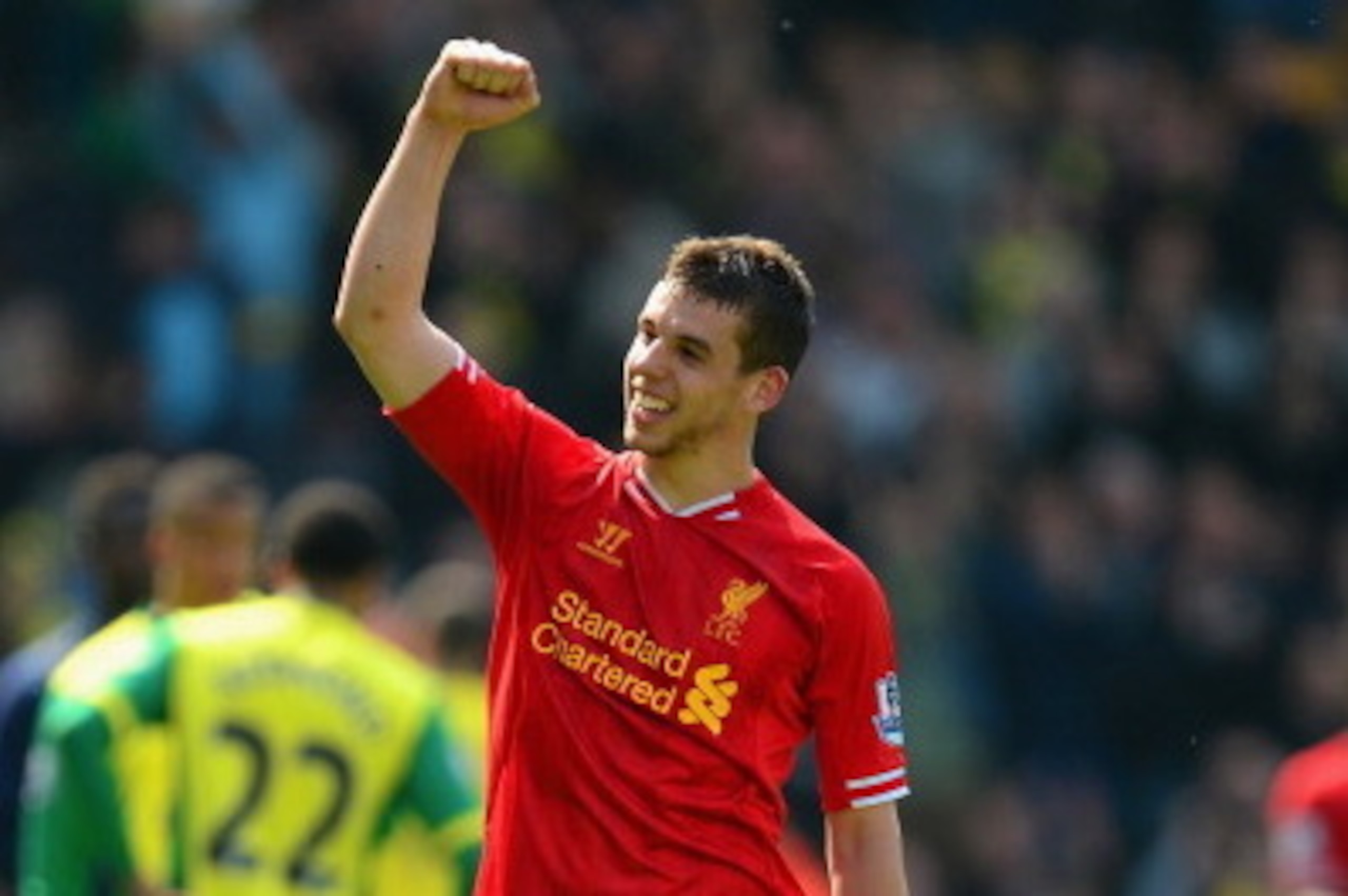 NORWICH, ENGLAND - APRIL 20:  Jon Flanagan of Liverpool celebrates victory at the final whistle during the Barclays Premier League match between Norwich City and Liverpool at Carrow Road on April 20, 2014 in Norwich, England.  (Photo by Jamie McDonald/Get