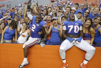 Easley (left) was beloved at Florida, but ACL tears in both knees cut his college career short.