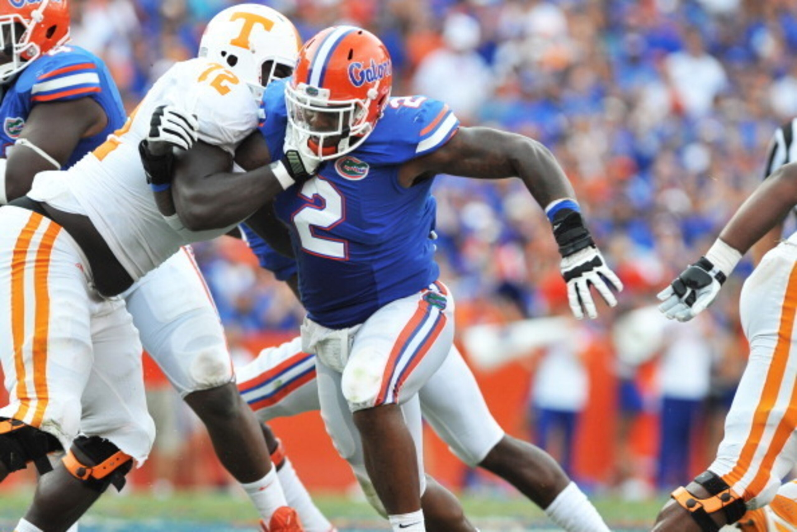 GAINESVILLE, FL - SEPTEMBER 21: Defensive lineman Dominique Easley #2 of the Florida Gators rushes upfield against Zach Fulton #72 of the Tennessee Volunteers September 21, 2013 at Ben Hill Griffin Stadium at Florida Field in Gainesville, Florida.  (Photo