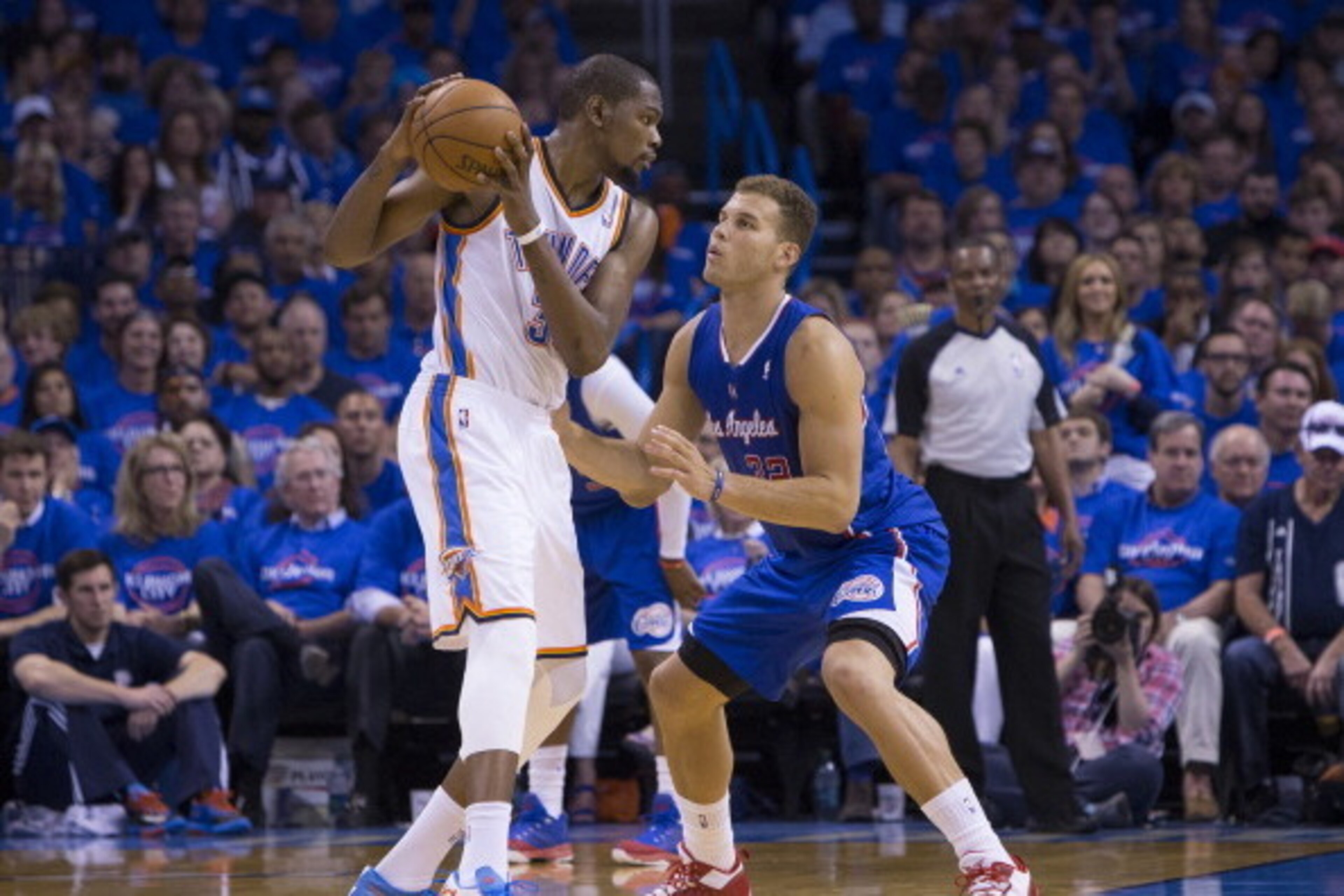 OKLAHOMA CITY, OK - MAY 5: Kevin Durant #35 of the Oklahoma City Thunder handles the ball against Blake Griffin #32 of the Los Angeles Clippers in Game One of the Western Conference Semifinals during the 2014 NBA Playoffs at the Chesapeake Arena on May 5,