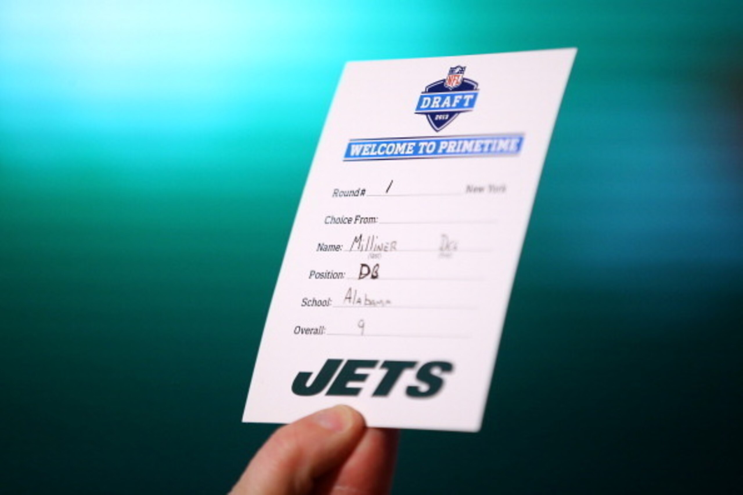 NEW YORK, NY - APRIL 25:  A detail of the draft card with the name of Dee Milliner of the Alabama Crimson Tide announcing that Milliner was the #9 overall pick by the New York Jets in the first round of the 2013 NFL Draft at Radio City Music Hall on April