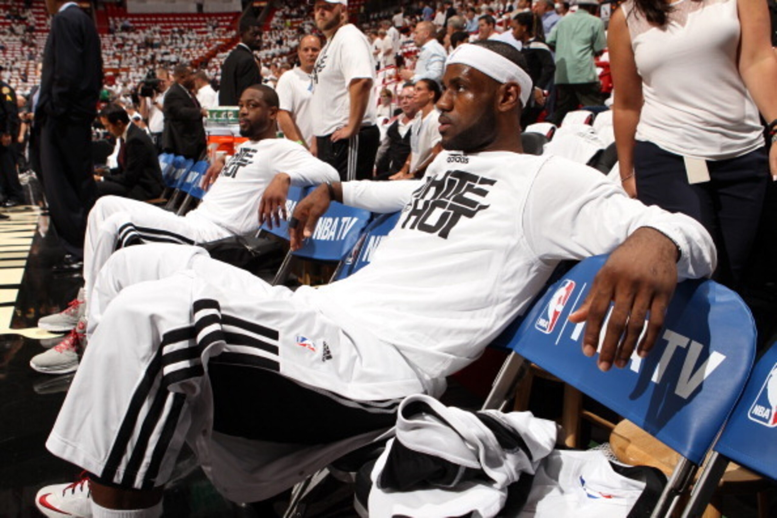 MIAMI, FL - MAY 6: LeBron James #6 and Dwyane Wade #3 of the Miami Heat get ready before Game One of the Eastern Conference Semi-Finals against the Brooklyn Nets during the 2014 NBA Playoffs at American Airlines Arena on May 6, 2014 in Miami, Florida. NOT