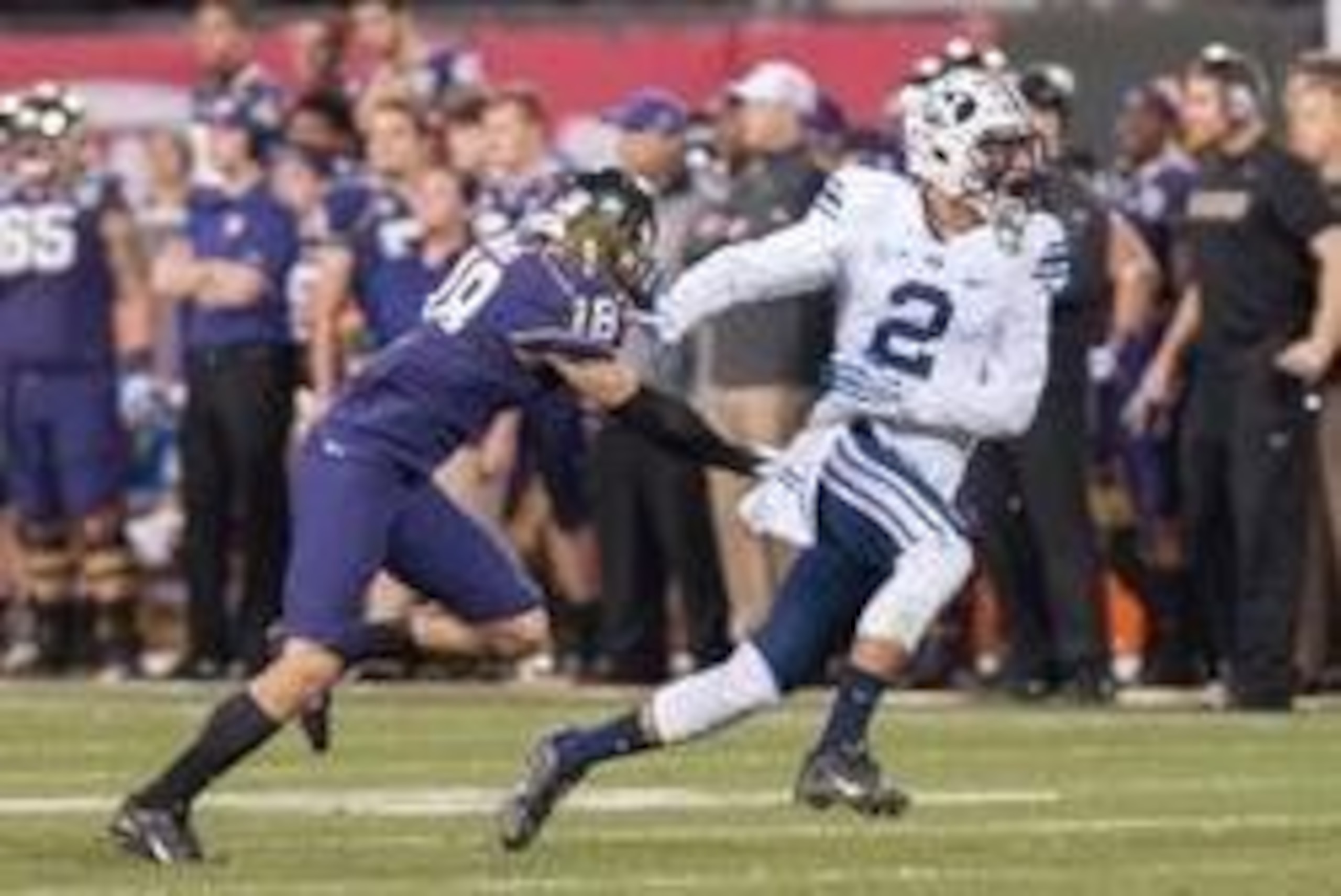 Dec 27, 2013; San Francisco, CA, USA; Brigham Young Cougars wide receiver Cody Hoffman (2) runs a route against Washington Huskies defensive back Gregory Ducre (18) during the second quarter at AT&T Park. Mandatory Credit: Ed Szczepanski-USA TODAY Sports
