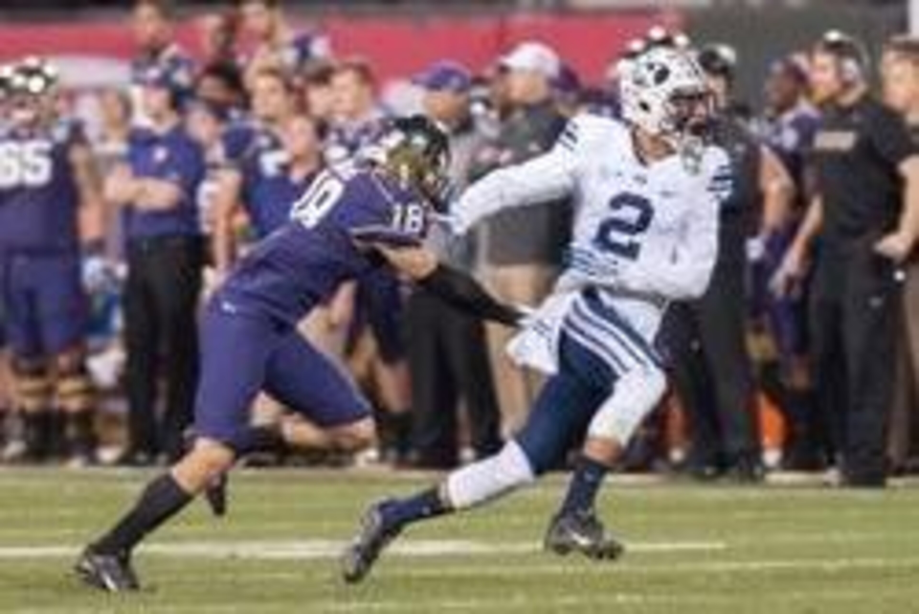 Dec 27, 2013; San Francisco, CA, USA; Brigham Young Cougars wide receiver Cody Hoffman (2) runs a route against Washington Huskies defensive back Gregory Ducre (18) during the second quarter at AT&T Park. Mandatory Credit: Ed Szczepanski-USA TODAY Sports