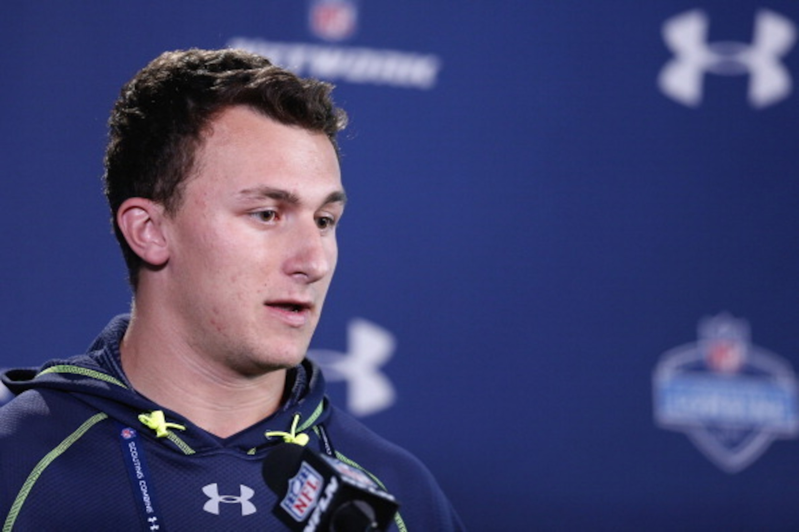 INDIANAPOLIS, IN - FEBRUARY 21: Former Texas A&M quarterback Johnny Manziel speaks to the media during the 2014 NFL Combine at Lucas Oil Stadium on February 21, 2014 in Indianapolis, Indiana. (Photo by Joe Robbins/Getty Images)