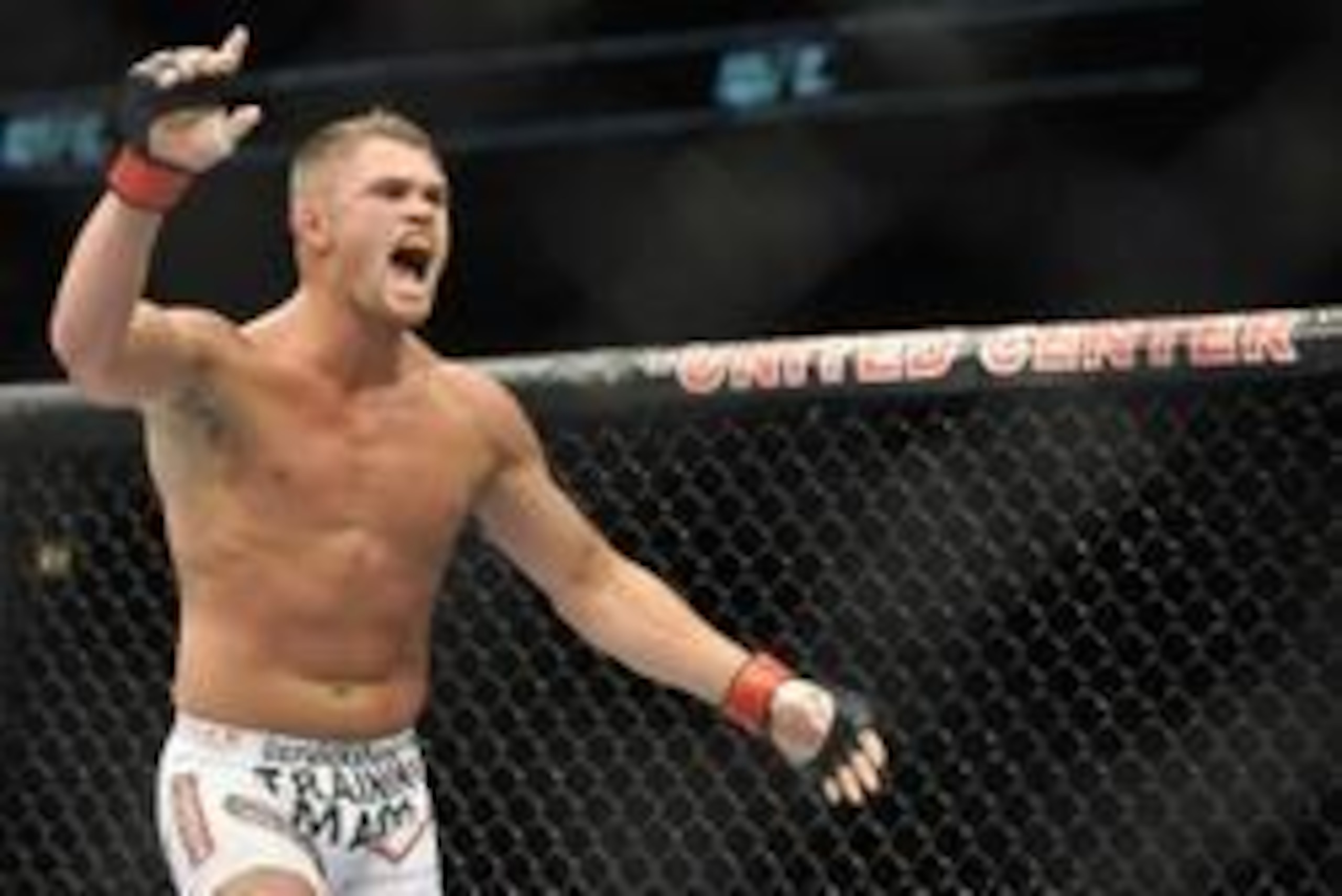 Jan 25, 2014; Chicago, IL, USA; Daron Cruickshank (red gloves) reacts after beating Mike Rio (not pictured) during UFC on FOX 10 at the United Center. Mandatory Credit: David Banks-USA TODAY Sports