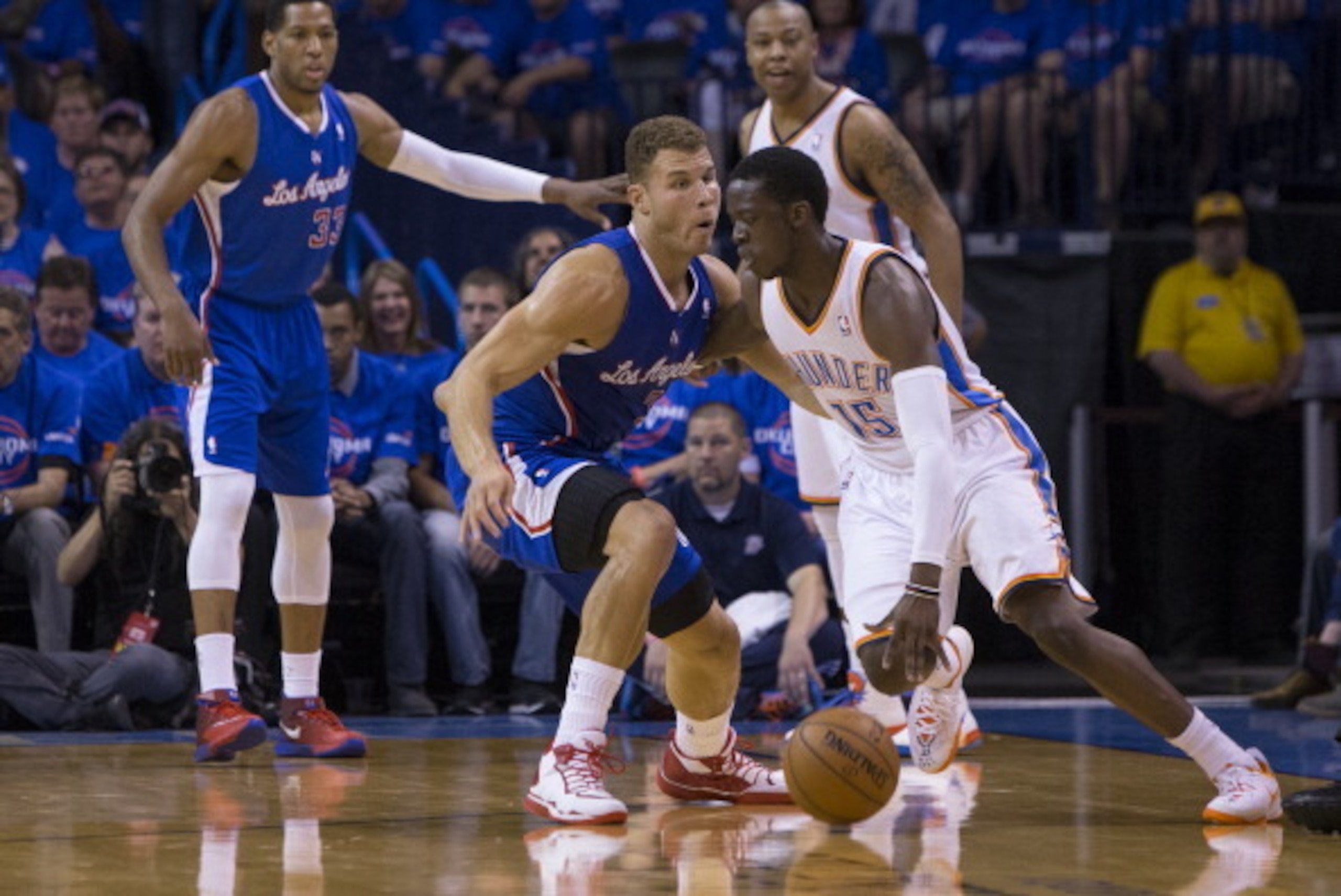OKLAHOMA CITY, OK - MAY 5: Reggie Jackson #15 of the Oklahoma City Thunder handles the ball against Blake Griffin #32 of the Los Angeles Clippers in Game One of the Western Conference Semifinals during the 2014 NBA Playoffs at the Chesapeake Arena on May 