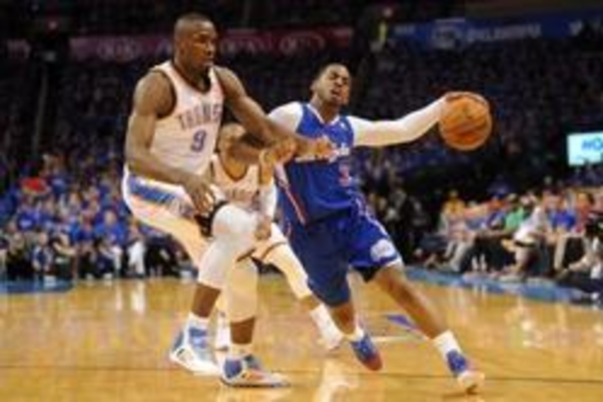 May 5, 2014; Oklahoma City, OK, USA; Los Angeles Clippers guard Chris Paul (3) handles the ball against Oklahoma City Thunder forward Serge Ibaka (9) during the second quarter in game one of the second round of the 2014 NBA Playoffs at Chesapeake Energy A