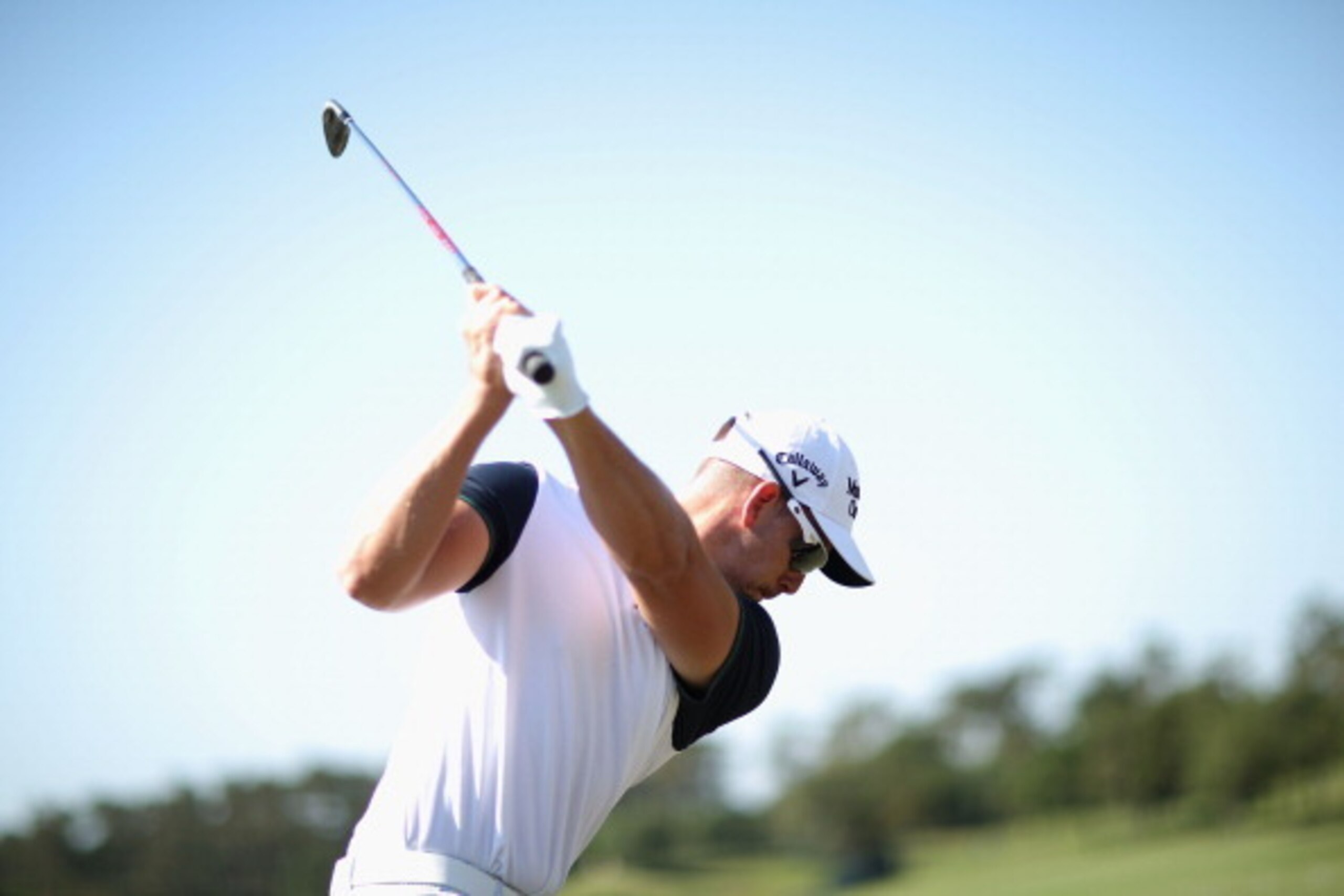 PONTE VEDRA BEACH, FL - MAY 07:  Henrik Stenson of Sweden hits a shot on the range during a practice round ahead of THE PLAYERS Championship on The Stadium Course at TPC Sawgrass on May 7, 2014 in Ponte Vedra Beach, Florida.  (Photo by Richard Heathcote/G