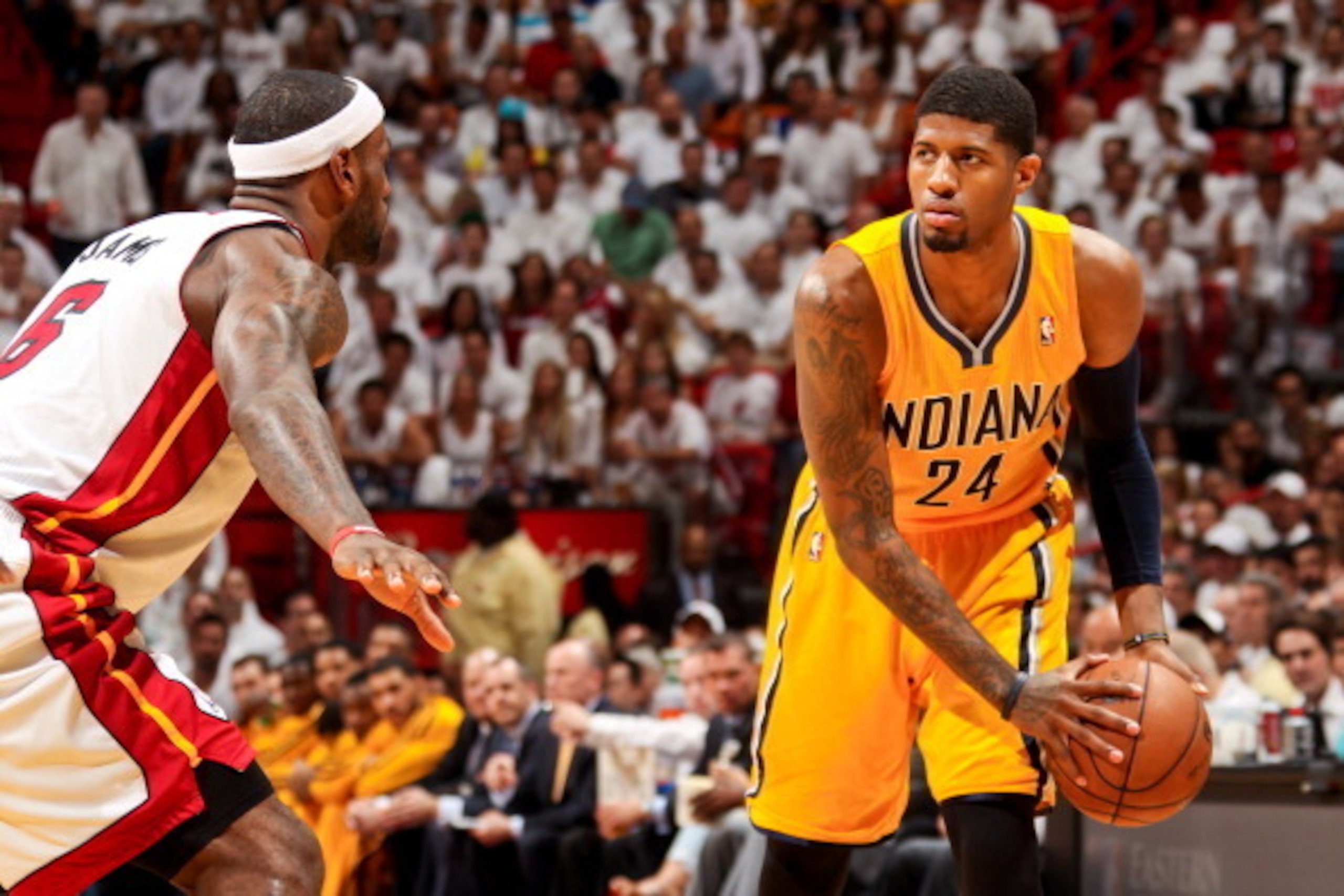 MIAMI, FL - JUNE 3: Paul George #24 of the Indiana Pacers controls the ball against LeBron James #6 of the Miami Heat in Game Seven of the Eastern Conference Finals during the 2013 NBA Playoffs on June 3, 2013 at American Airlines Arena in Miami, Florida.