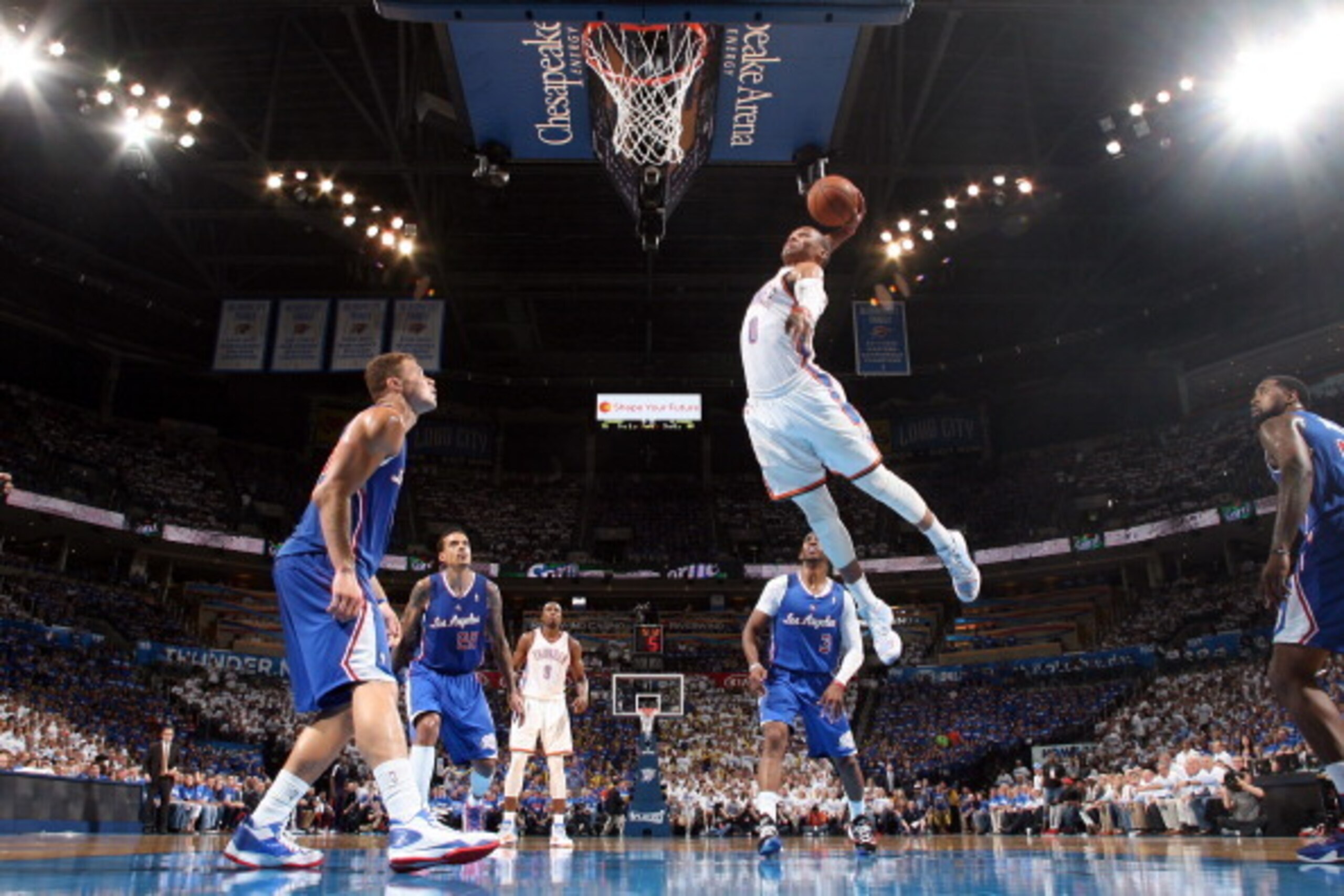 OKLAHOMA CITY, OK - MAY 7: Russell Westbrook #0 of the Oklahoma City Thunder goes up for a dunk against the Los Angeles Clippers in Game Two of the Western Conference Semifinals during the 2014 NBA Playoffs on May 7, 2014 at the Chesapeake Energy Arena in