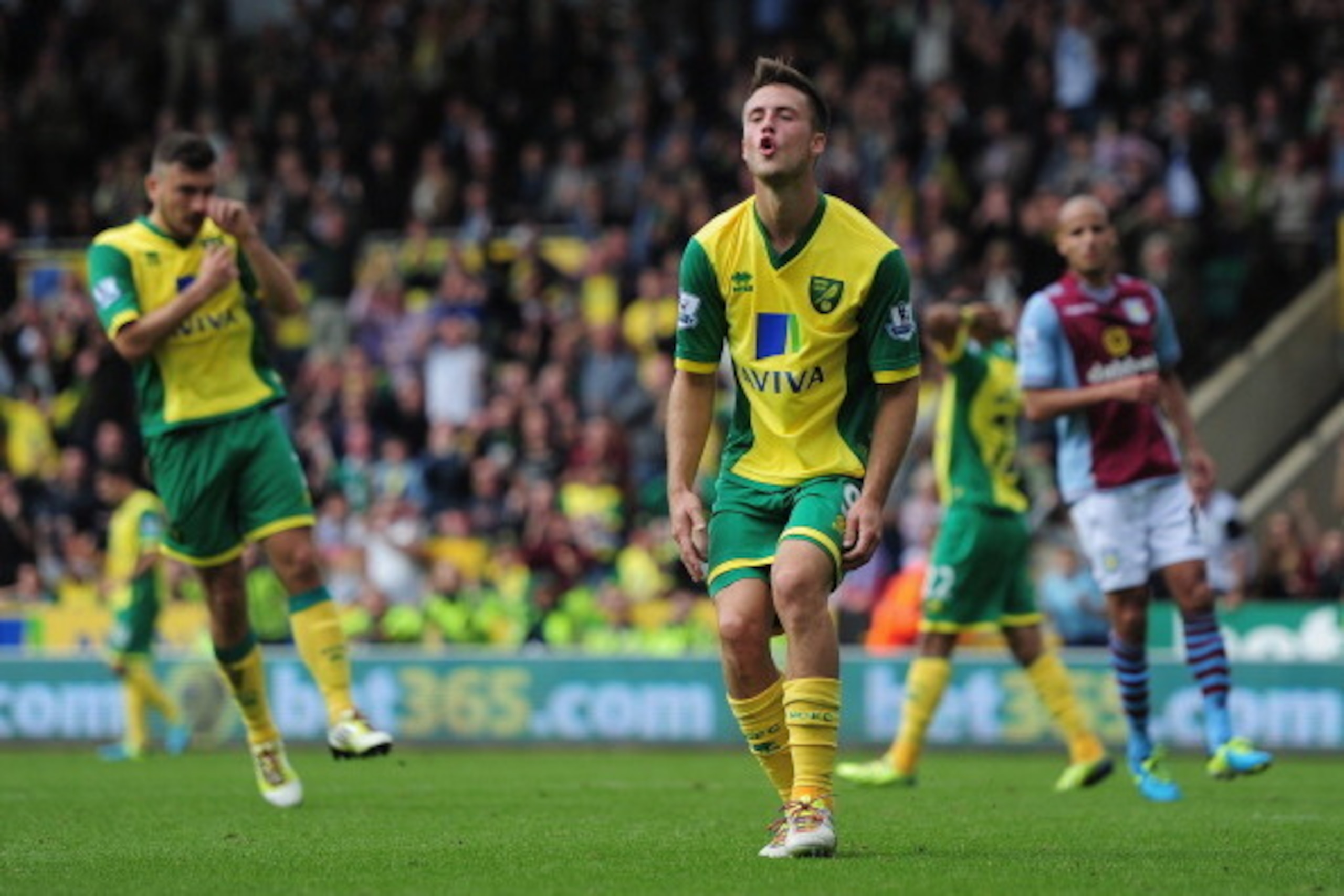 NORWICH, ENGLAND - SEPTEMBER 21:  Ricky van Wolfswinkel rues a missed chance of Norwich City misses a penalty during the Barclays Premier League match between Norwich City and Aston Villa at Carrow Road on September 21, 2013 in Norwich, England.  (Photo b