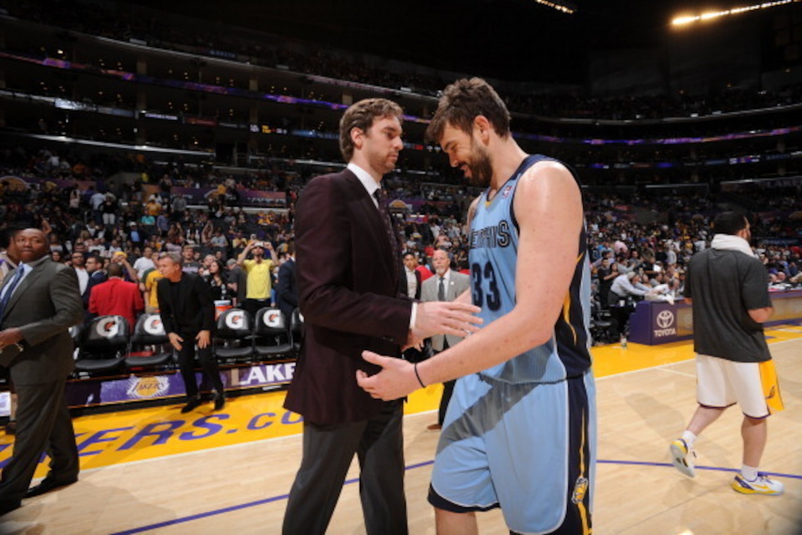 LOS ANGELES, CA - APRIL 13: Pau Gasol #16 of the Los Angeles Lakers and Marc Gasol #33 of the Memphis Grizzlies greet each other after their game at Staples Center on April 13, 2014 in Los Angeles, California. NOTE TO USER: User expressly acknowledges and
