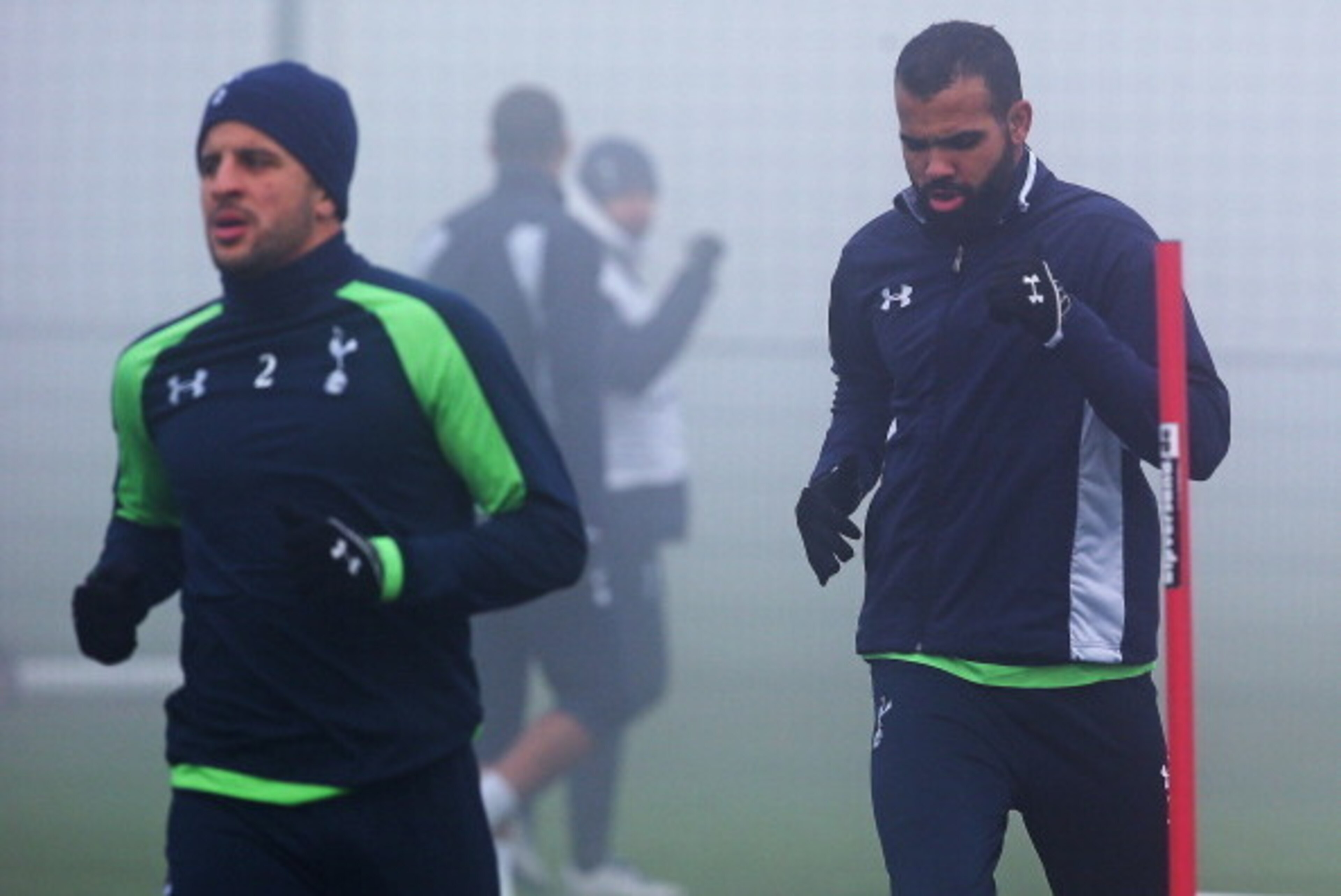 ENFIELD, ENGLAND - DECEMBER 11: Sandro (R) runs through a drill during Tottenham Hotspur training session ahead of their UEFA Europa League group match against FC Anji at Hotspur Way on December 11, 2013 in London, England. (Photo by Charlie Crowhurst/Get