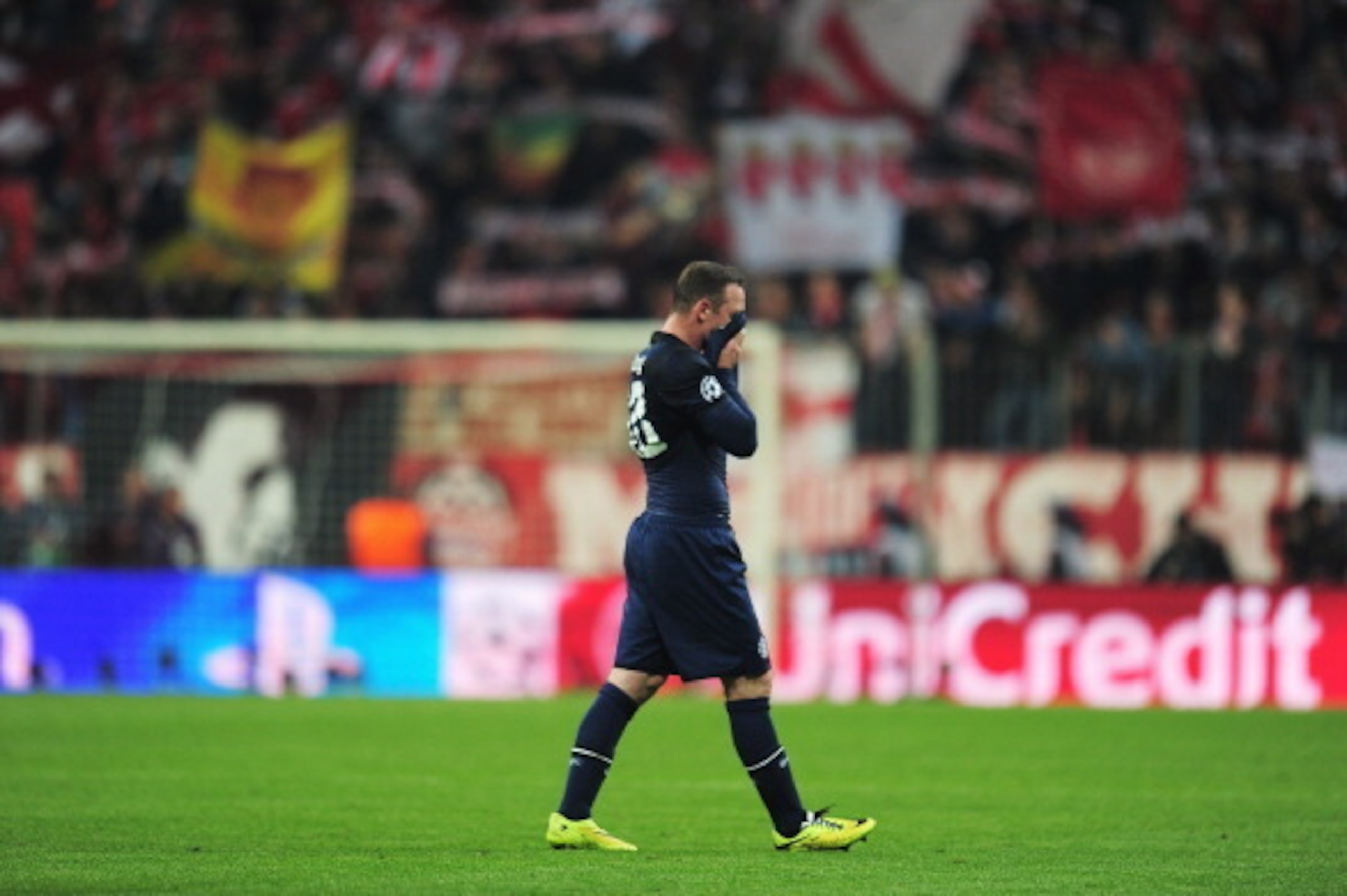 MUNICH, GERMANY - APRIL 09: Wayne Rooney of Manchester United leaves the field dejected after the UEFA Champions League Quarter Final second leg match between FC Bayern Muenchen and Manchester United at Allianz Arena on April 9, 2014 in Munich, Germany. MUNICH, GERMANY - APRIL 09: Wayne Rooney of Manchester United leaves the field dejected after the UEFA Champions League Quarter Final second leg match between FC Bayern Muenchen and Manchester United at Allianz Arena on April 9, 2014 in Munich, Germany.