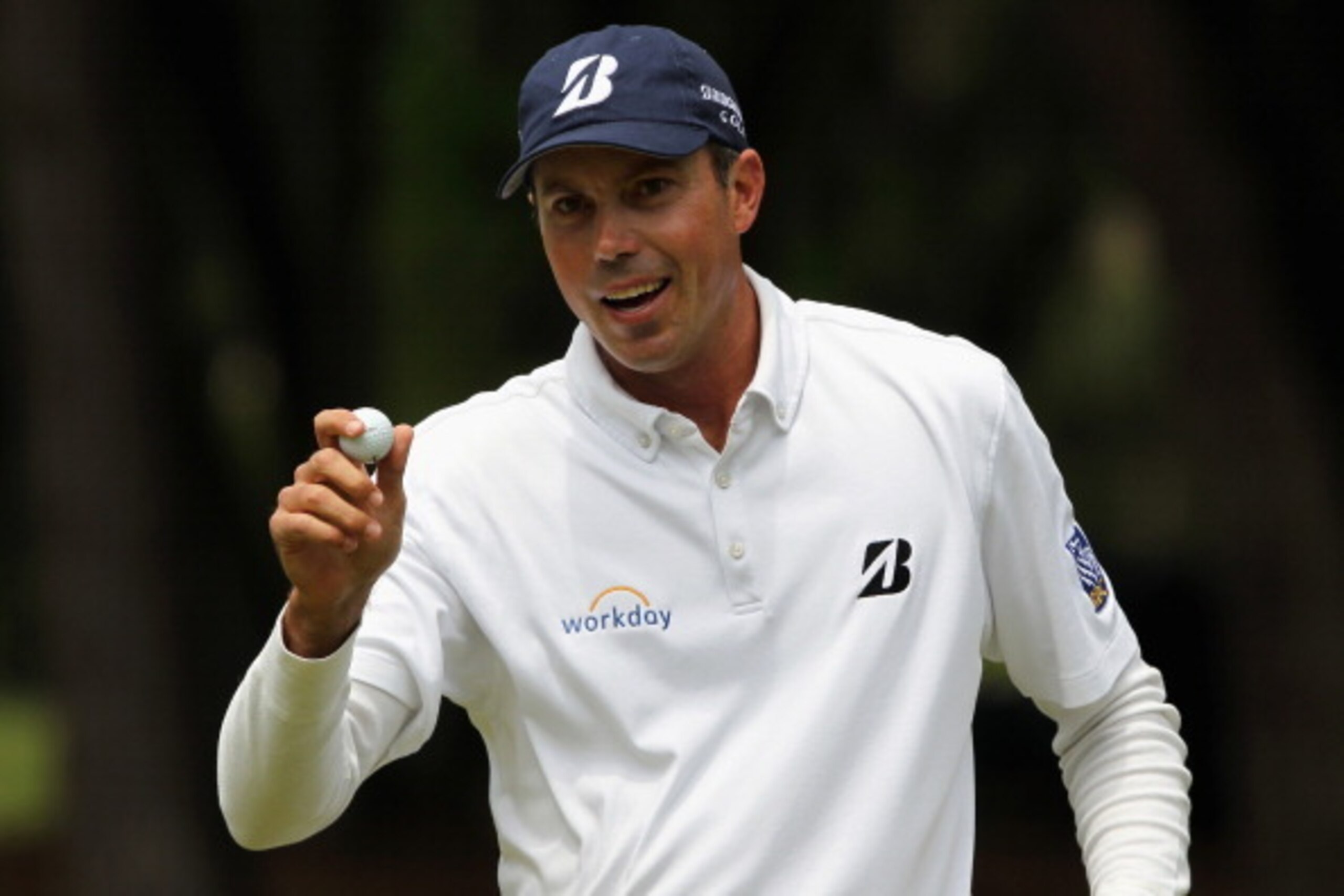 HILTON HEAD ISLAND, SC - APRIL 20:  Matt Kuchar acknowledges the gallery on the 1st green during the final round of the RBC Heritage at Harbour Town Golf Links on April 20, 2014 in Hilton Head Island, South Carolina.  (Photo by Tyler Lecka/Getty Images)