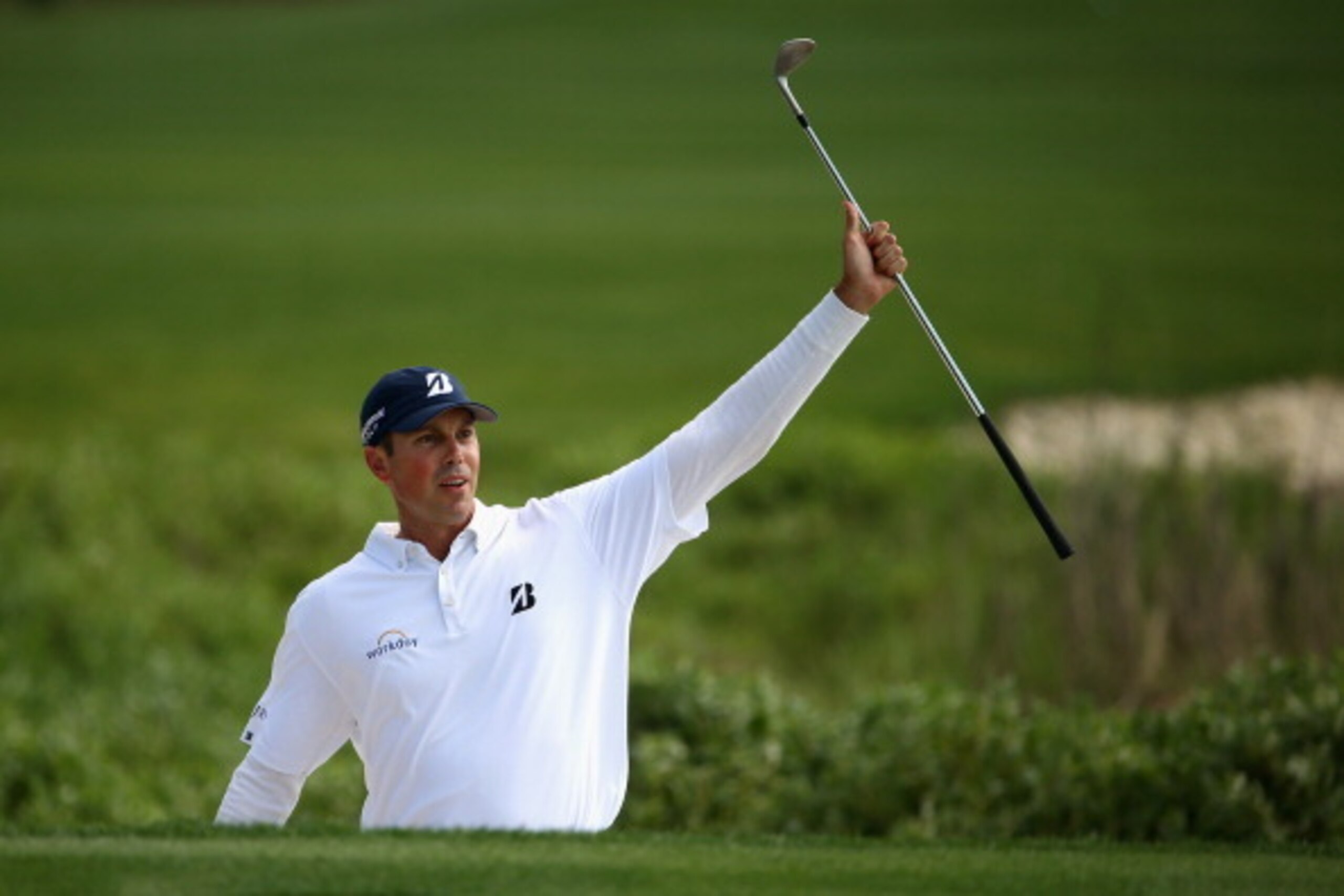 HILTON HEAD ISLAND, SC - APRIL 20:  Matt Kuchar reacts on the 18th green during the final round of the RBC Heritage at Harbour Town Golf Links on April 20, 2014 in Hilton Head Island, South Carolina.  (Photo by Streeter Lecka/Getty Images)