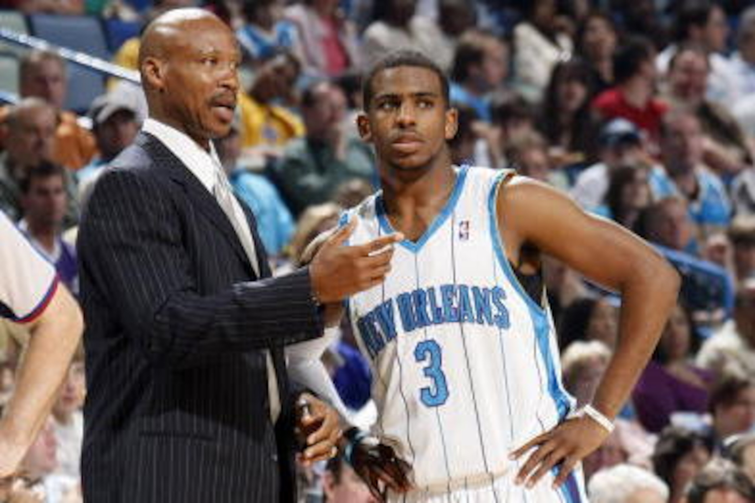 NEW ORLEANS - MARCH 22: Head coach Byron Scott of the New Orleans Hornets speaks with Chris Paul #3 during the Hornets' game against the Golden State Warriors on March 22, 2009 at the New Orleans Arena in New Orleans, Louisiana. NOTE TO USER: User express