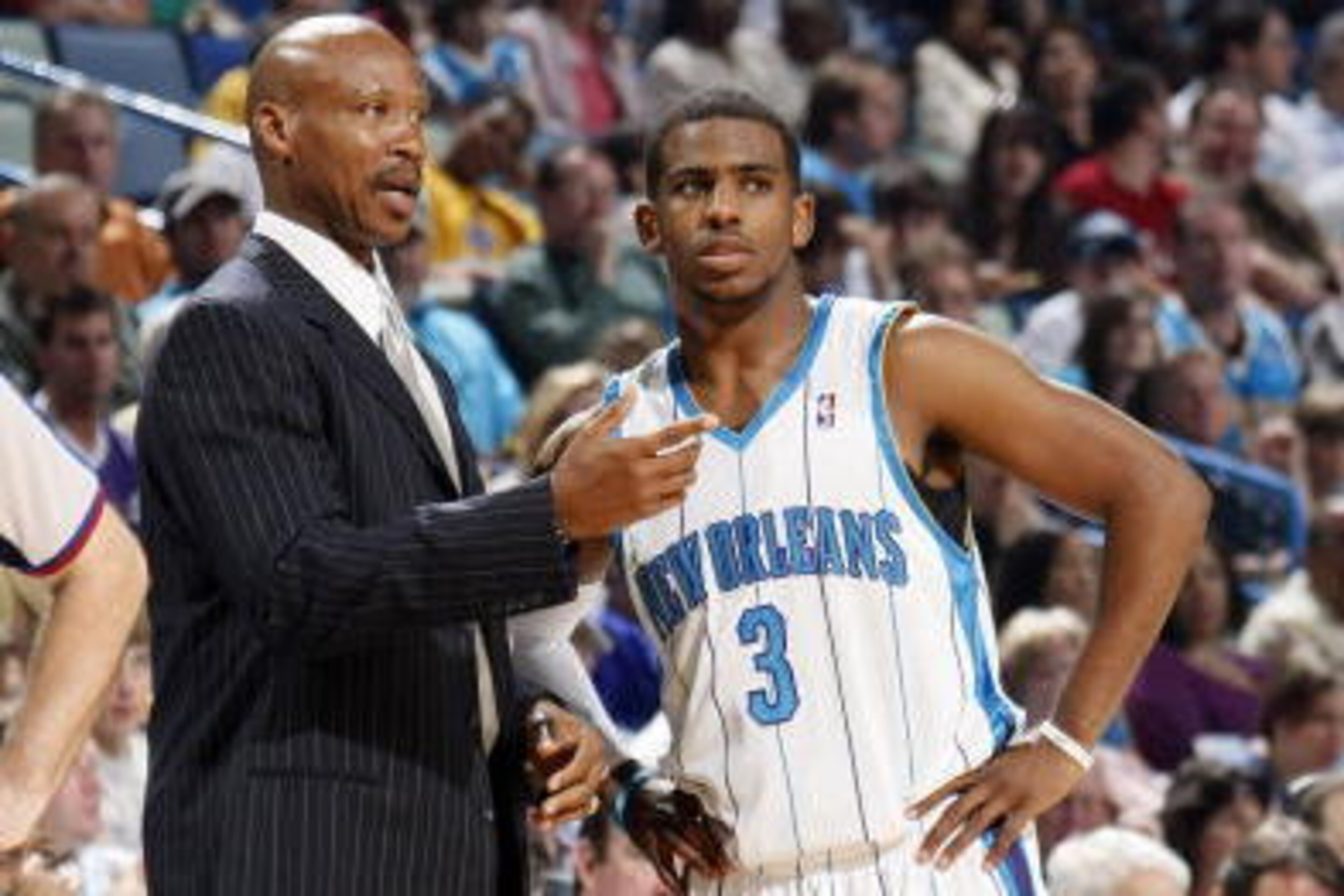 NEW ORLEANS - MARCH 22: Head coach Byron Scott of the New Orleans Hornets speaks with Chris Paul #3 during the Hornets' game against the Golden State Warriors on March 22, 2009 at the New Orleans Arena in New Orleans, Louisiana. NOTE TO USER: User express