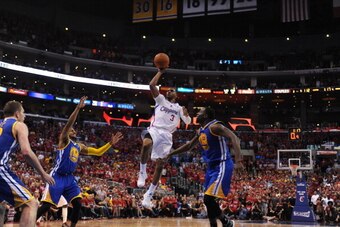 LOS ANGELES, CA - MAY 3: Chris Paul #3 of the Los Angeles Clippers shoots against the Golden State Warriors in Game Seven of the Western Conference Quarterfinals during the 2014 NBA Playoffs at Staples Center on May 3, 2014 in Los Angeles, California. NOT