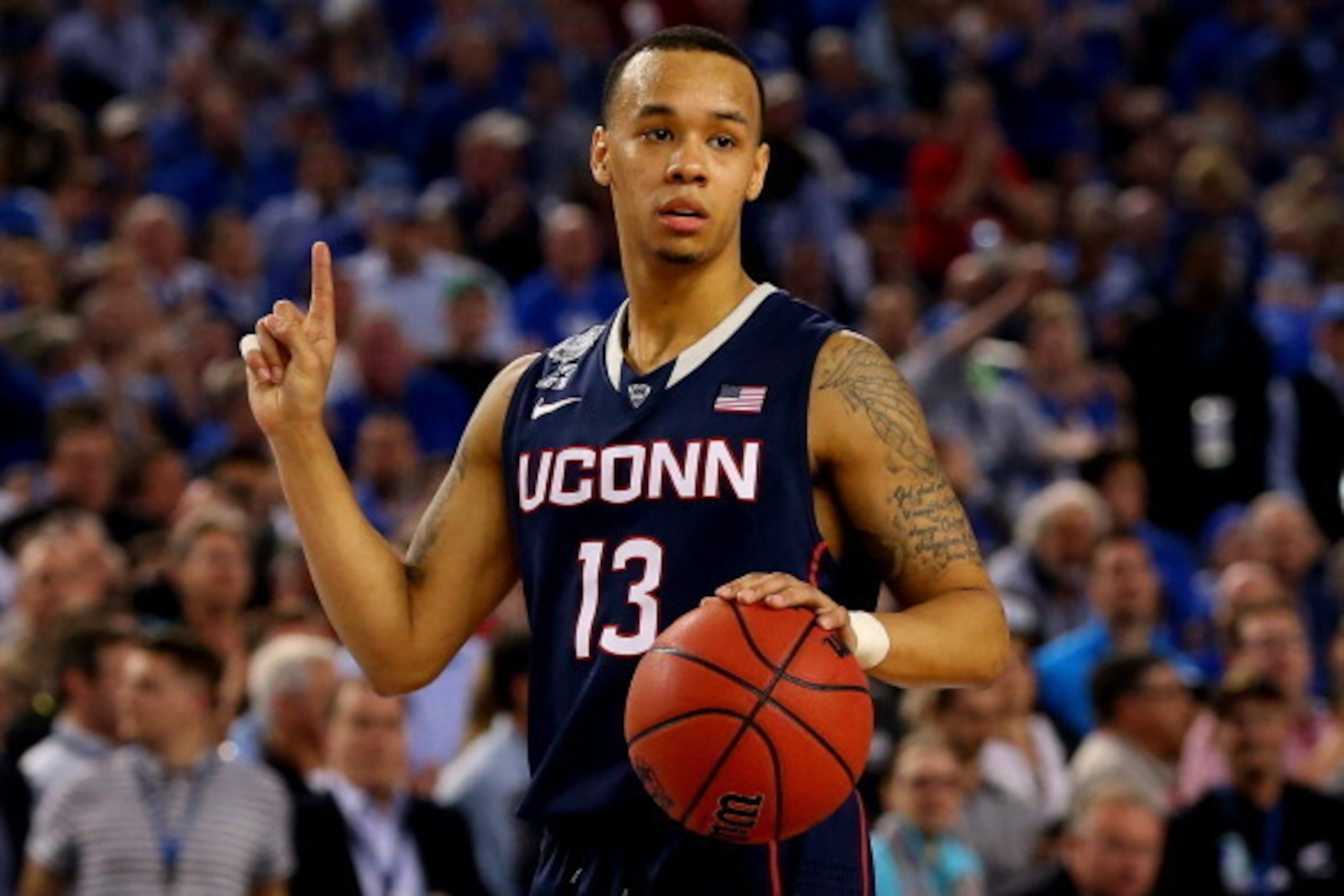ARLINGTON, TX - APRIL 05: Shabazz Napier #13 of the Connecticut Huskies reacts during the NCAA Men's Final Four Semifinal against the Florida Gators at AT&T Stadium on April 5, 2014 in Arlington, Texas. The Connecticut Huskies defeated the Florida Gators 