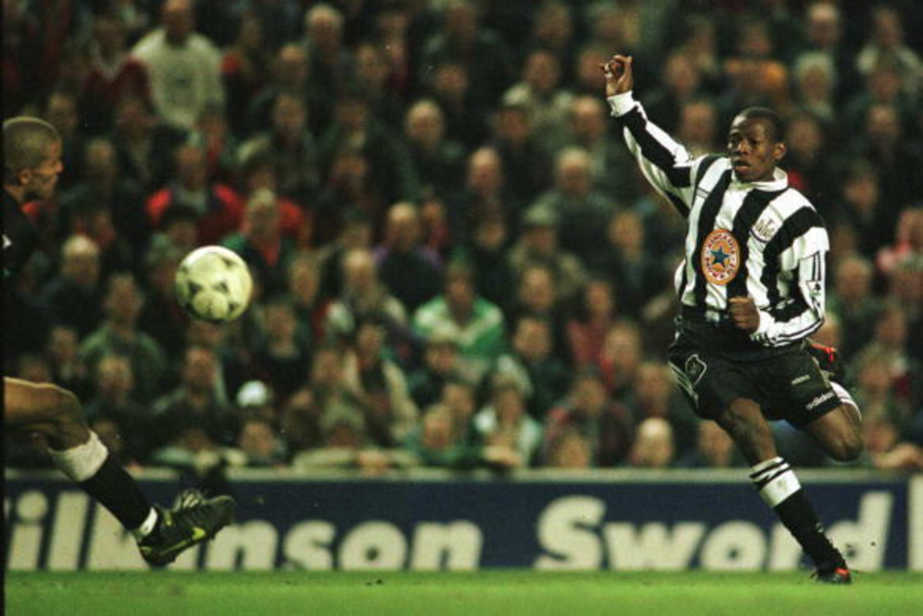 03 Apr 1996:  The ball flies past the reach of thew goalkeeper as Asprilla of Newcastle scores against Liverpool during their FA Premiership game at Anfield, Liverpool. Mandatory Credit: Allsport UK/Allsport
