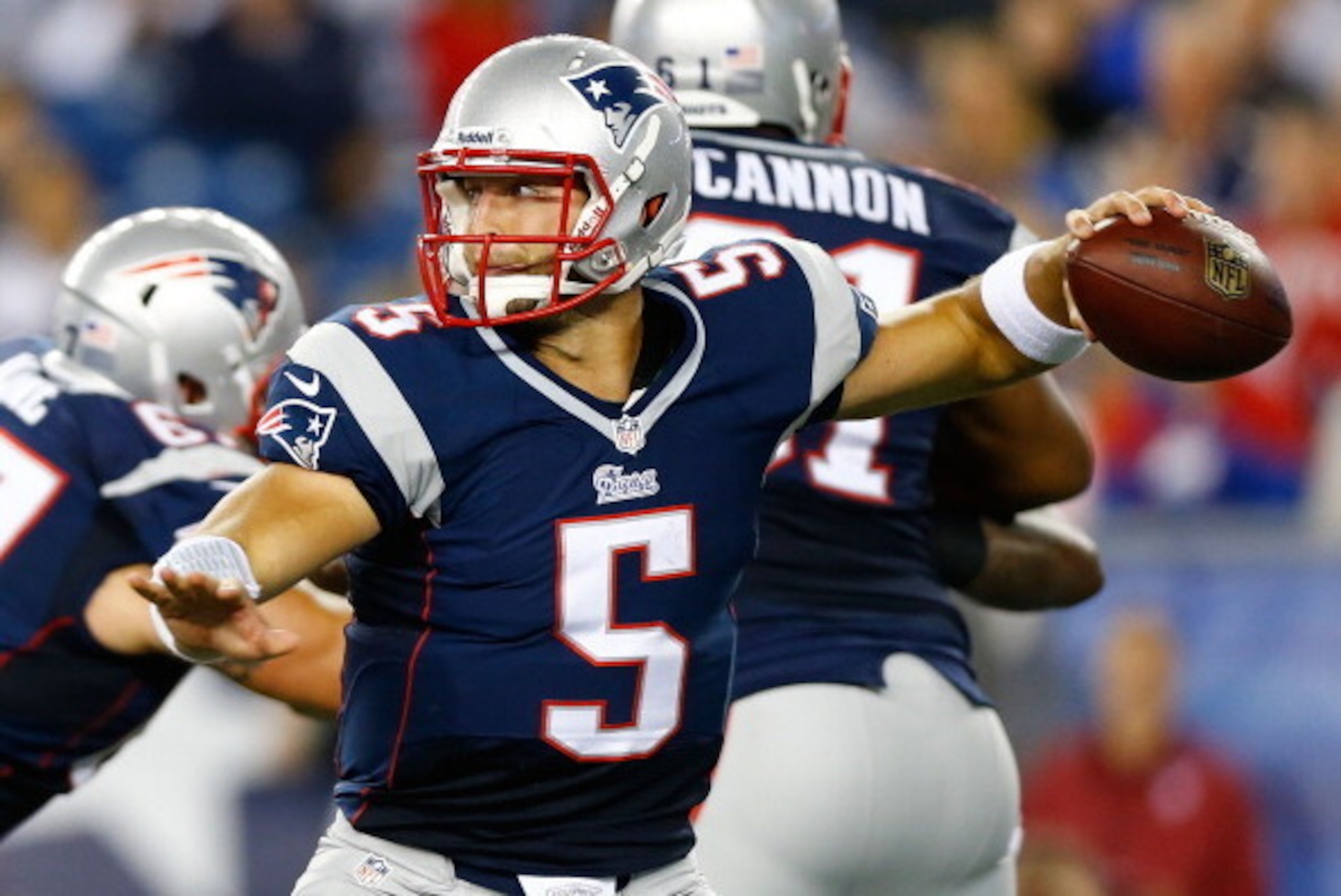 FOXBORO, MA - AUGUST 29: Tim Tebow #5 of the New England Patriots throws a pass against the New York Giants in the second half during the preseason game at Gillette Stadium on August 29, 2013 in Foxboro, Massachusetts. (Photo by Jared Wickerham/Getty Imag