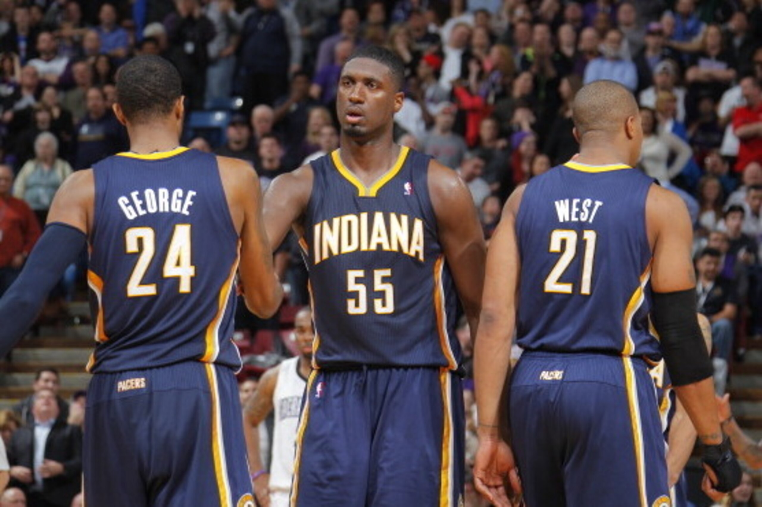SACRAMENTO, CA - JANUARY 24: Paul George #24, Roy Hibbert #55 and David West #21 of the Indiana Pacers in a game against the Sacramento Kings on January 24, 2014 at Sleep Train Arena in Sacramento, California. NOTE TO USER: User expressly acknowledges and