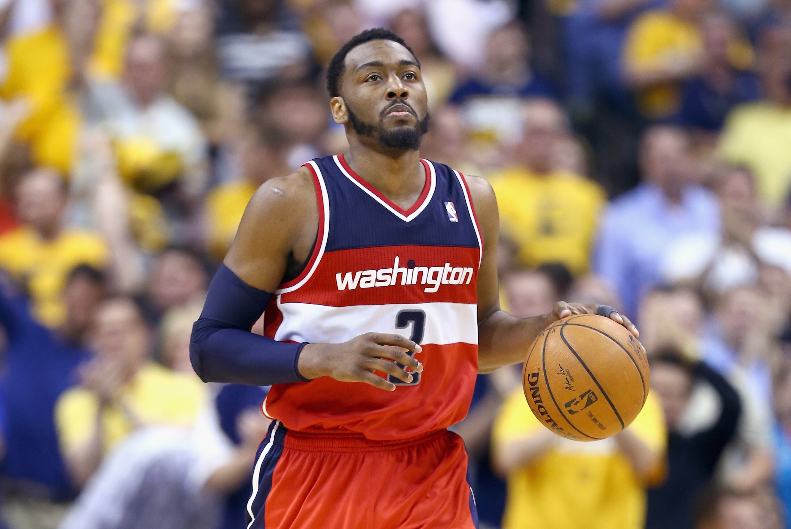 INDIANAPOLIS, IN - MAY 07:  John Wall #2 of the  Washington Wizards dribbles the ball against the Indiana Pacers  in Game 2 of the Eastern Conference Semifinals during the 2014 NBA Playoffs at Bankers Life Fieldhouse on May 7, 2014 in Indianapolis, Indian