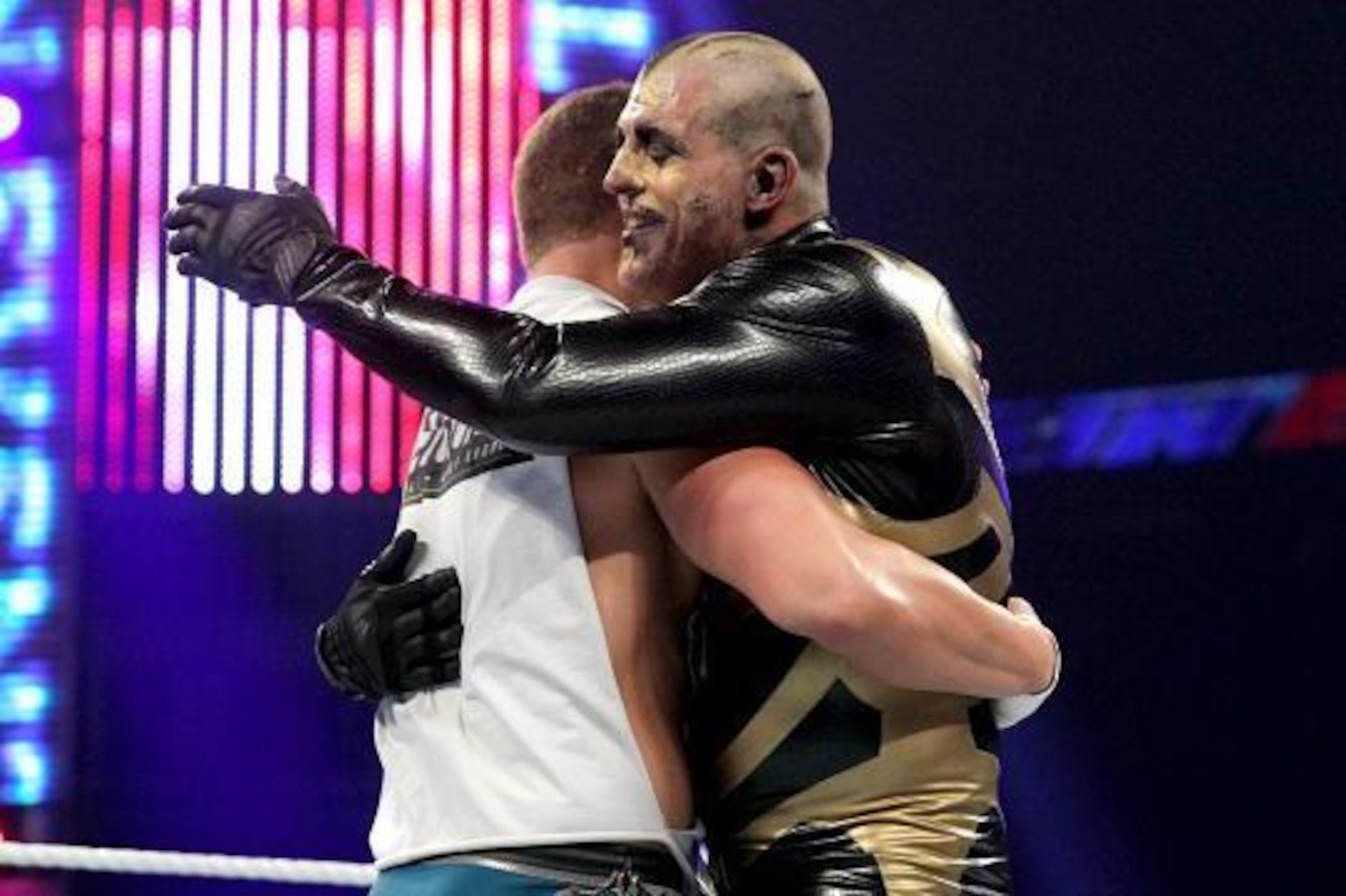 Goldust and Rhodes embrace on Tuesday's Main Event.