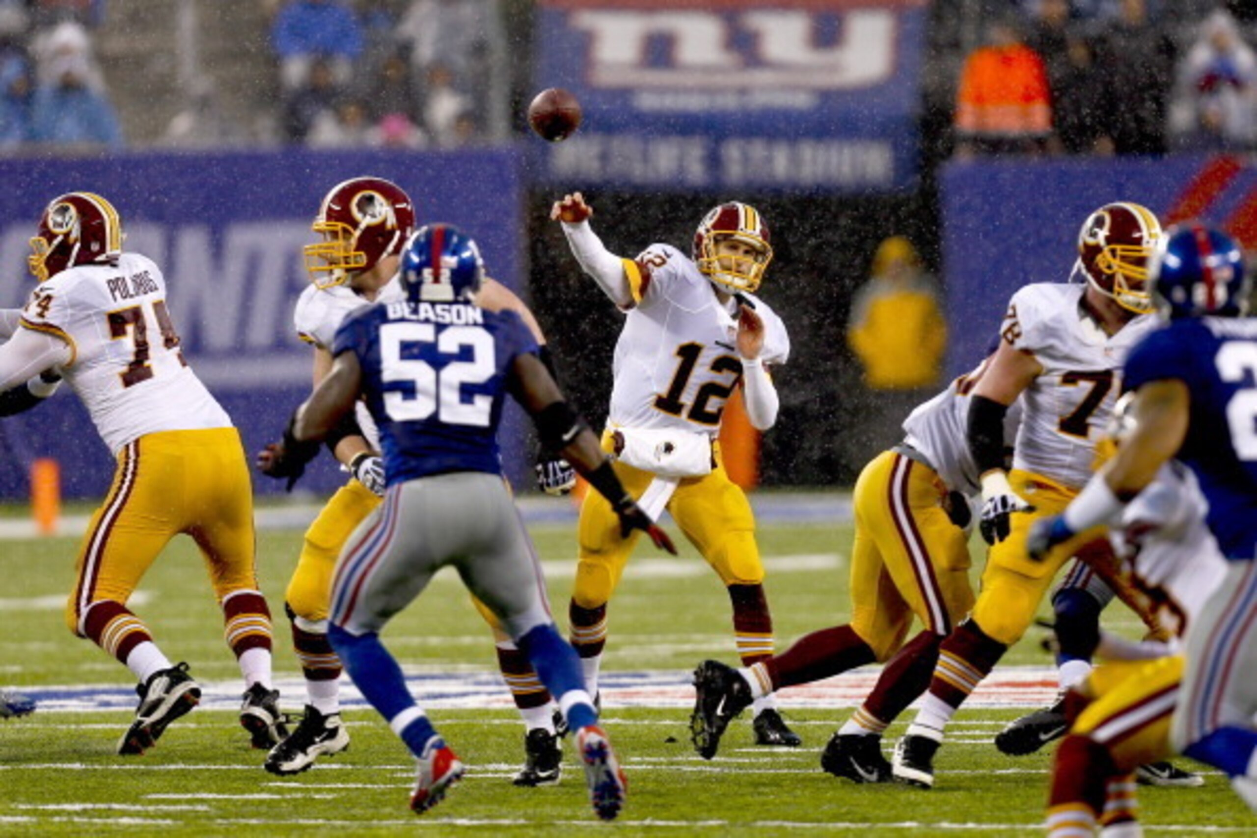 EAST RUTHERFORD, NJ - DECEMBER 29: Kirk Cousins #12 of the Washington Redskins passes against the New York Giants during the second half of their game at MetLife Stadium on December 29, 2013 in East Rutherford, New Jersey. (Photo by Jeff Zelevansky/Get EAST RUTHERFORD, NJ - DECEMBER 29: Kirk Cousins #12 of the Washington Redskins passes against the New York Giants during the second half of their game at MetLife Stadium on December 29, 2013 in East Rutherford, New Jersey. (Photo by Jeff Zelevansky/Get