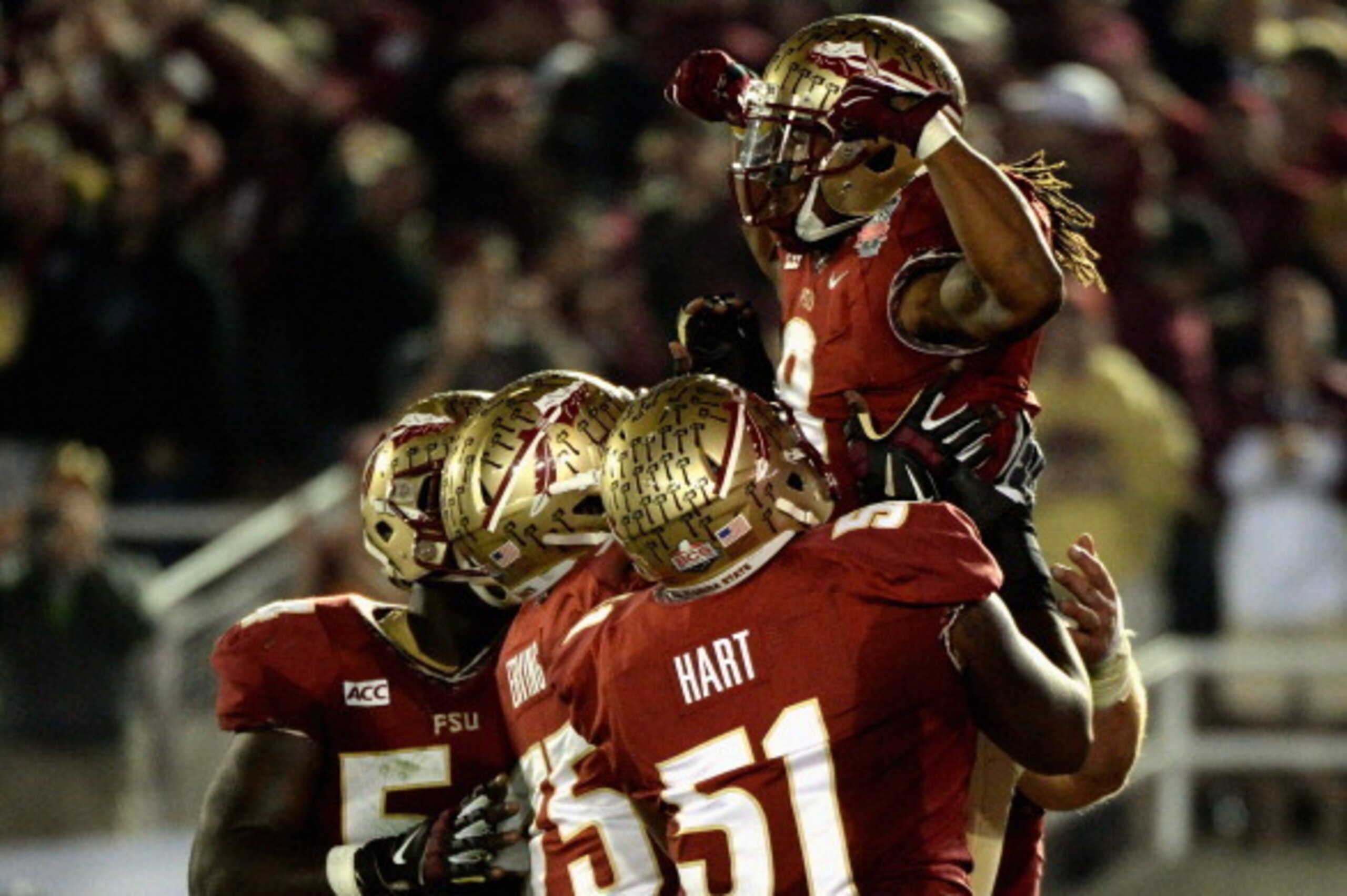 PASADENA, CA - JANUARY 06:  Running back Devonta Freeman #8 of the Florida State Seminoles celebrates after a three-yard rush for a touchdown against the Auburn Tigers in the second quarter of the 2014 Vizio BCS National Championship Game at the Rose Bowl