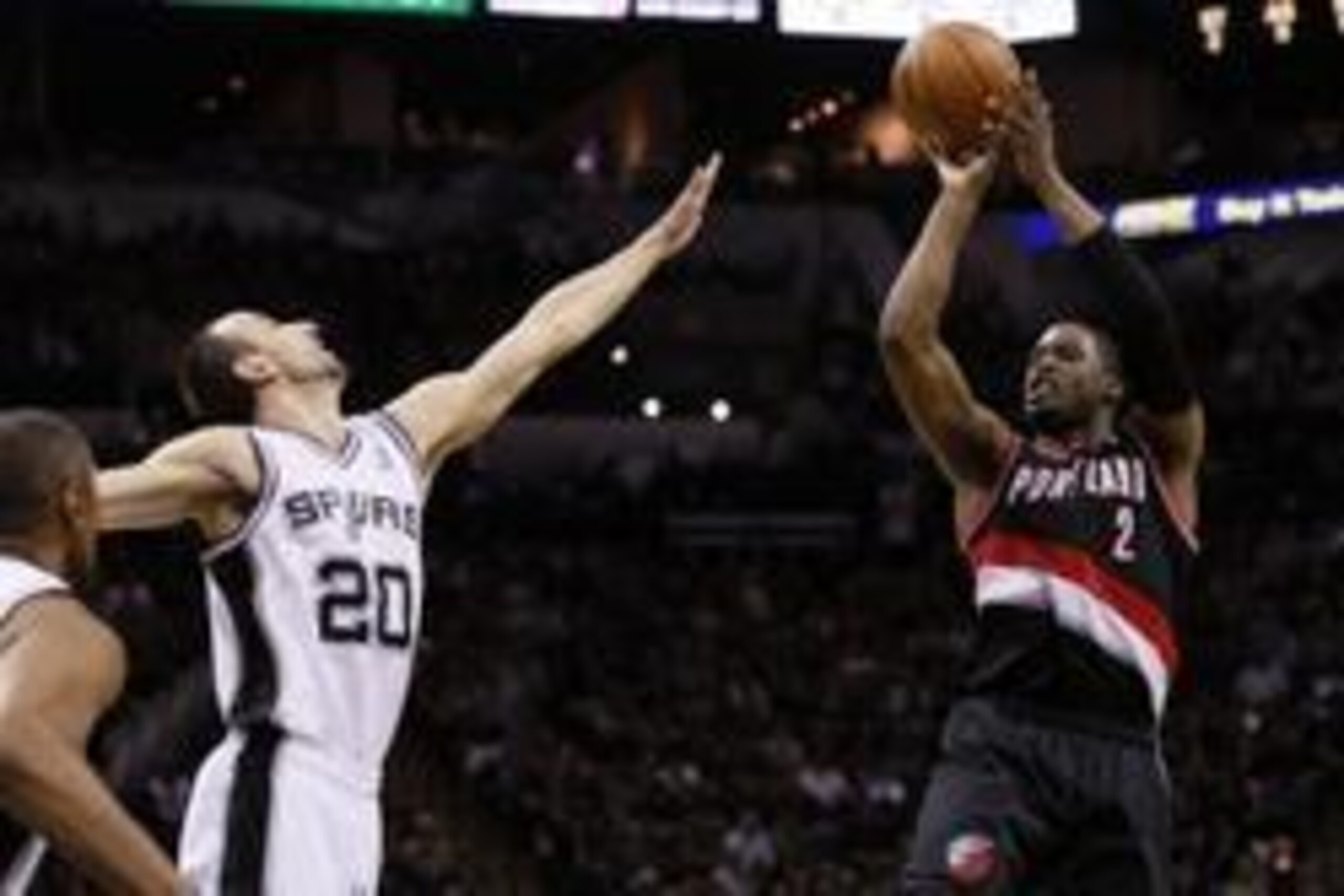May 8, 2014; San Antonio, TX, USA; Portland Trail Blazers guard Wesley Matthews (2) shoots the ball as San Antonio Spurs guard Manu Ginobili (20) defends in game two of the second round of the 2014 NBA Playoffs at AT&T Center. Mandatory Credit: Soobum Im-