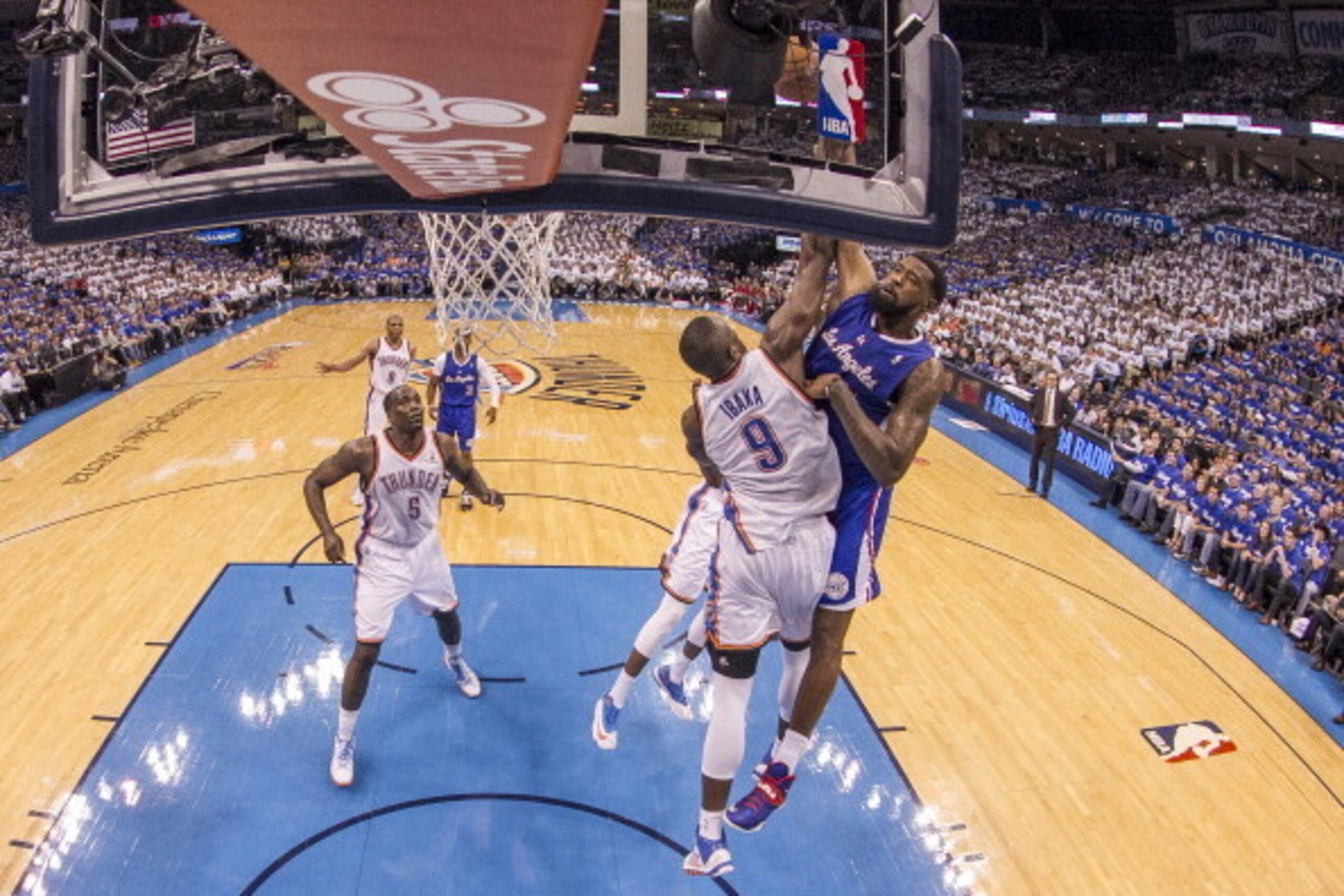 OKLAHOMA CITY, OK - MAY 7: DeAndre Jordan #6 of the Los Angeles Clippers shoots against Serge Ibaka #9 of the Oklahoma City Thunder in Game 2 of the Western Conference Semifinals during the 2014 NBA Playoffs at the Chesapeake Arena on May 7, 2014 in Oklah OKLAHOMA CITY, OK - MAY 7: DeAndre Jordan #6 of the Los Angeles Clippers shoots against Serge Ibaka #9 of the Oklahoma City Thunder in Game 2 of the Western Conference Semifinals during the 2014 NBA Playoffs at the Chesapeake Arena on May 7, 2014 in Oklah