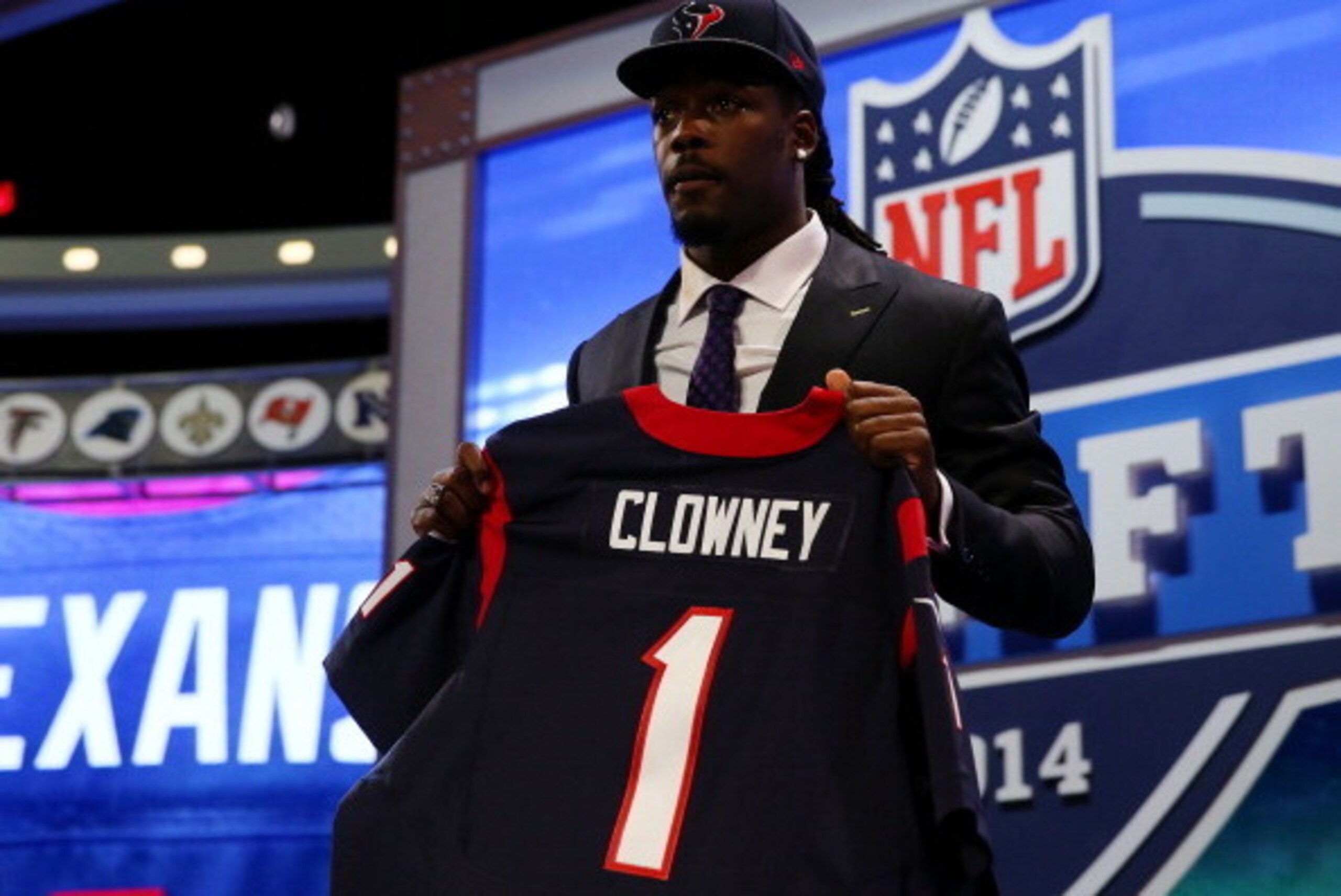 NEW YORK, NY - MAY 08:  Jadeveon Clowney of the South Carolina Gamecocks poses with a jersey after he was picked #1 overall by the Houston Texansduring the first round of the 2014 NFL Draft at Radio City Music Hall on May 8, 2014 in New York City.  (Photo