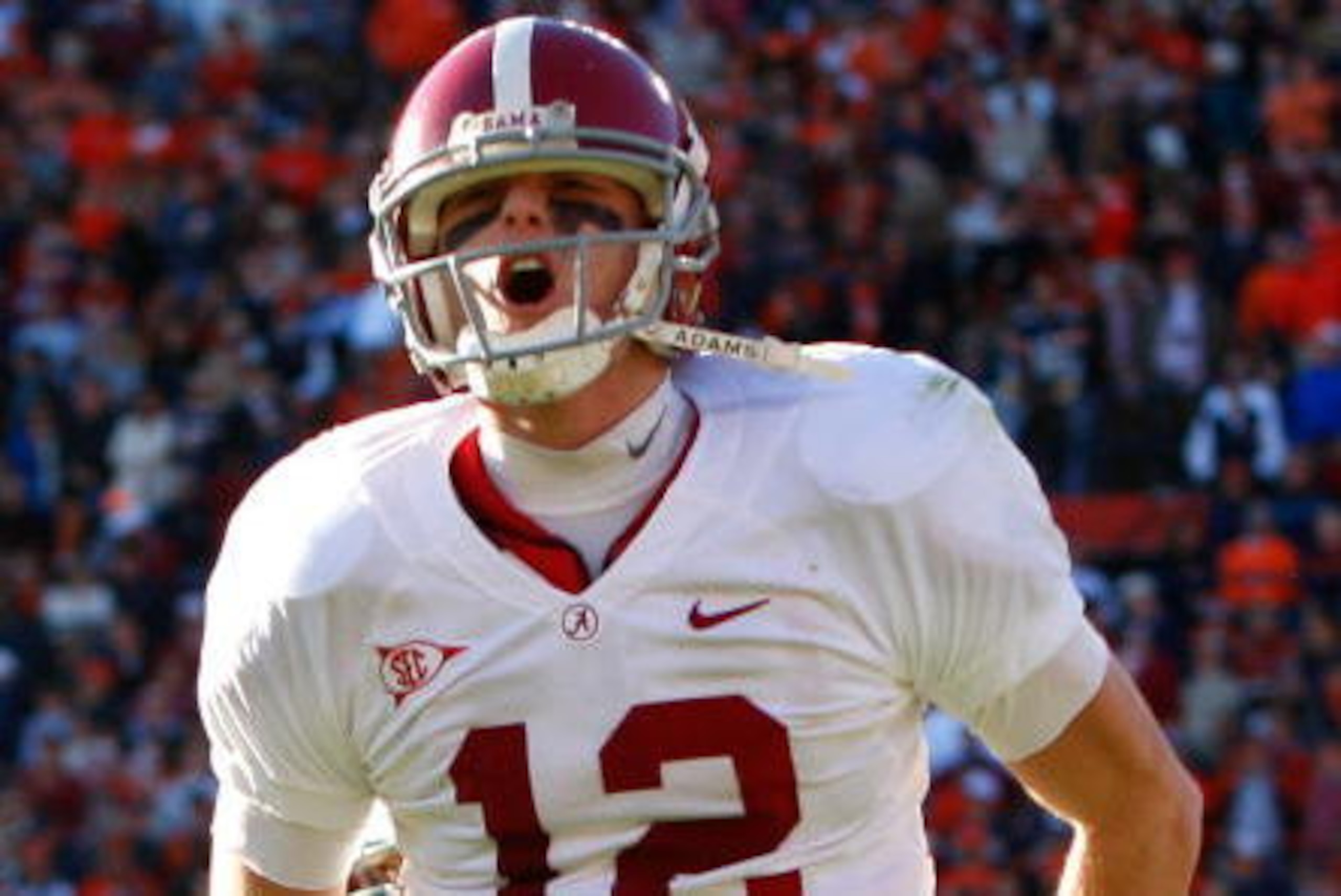 AUBURN, AL - NOVEMBER 27:  Quarterback Greg McElroy #12 of the Alabama Crimson Tide celebrates a touchdown against the Auburn Tigers at Jordan-Hare Stadium on November 27, 2009 in Auburn, Alabama.  (Photo by Kevin C. Cox/Getty Images)