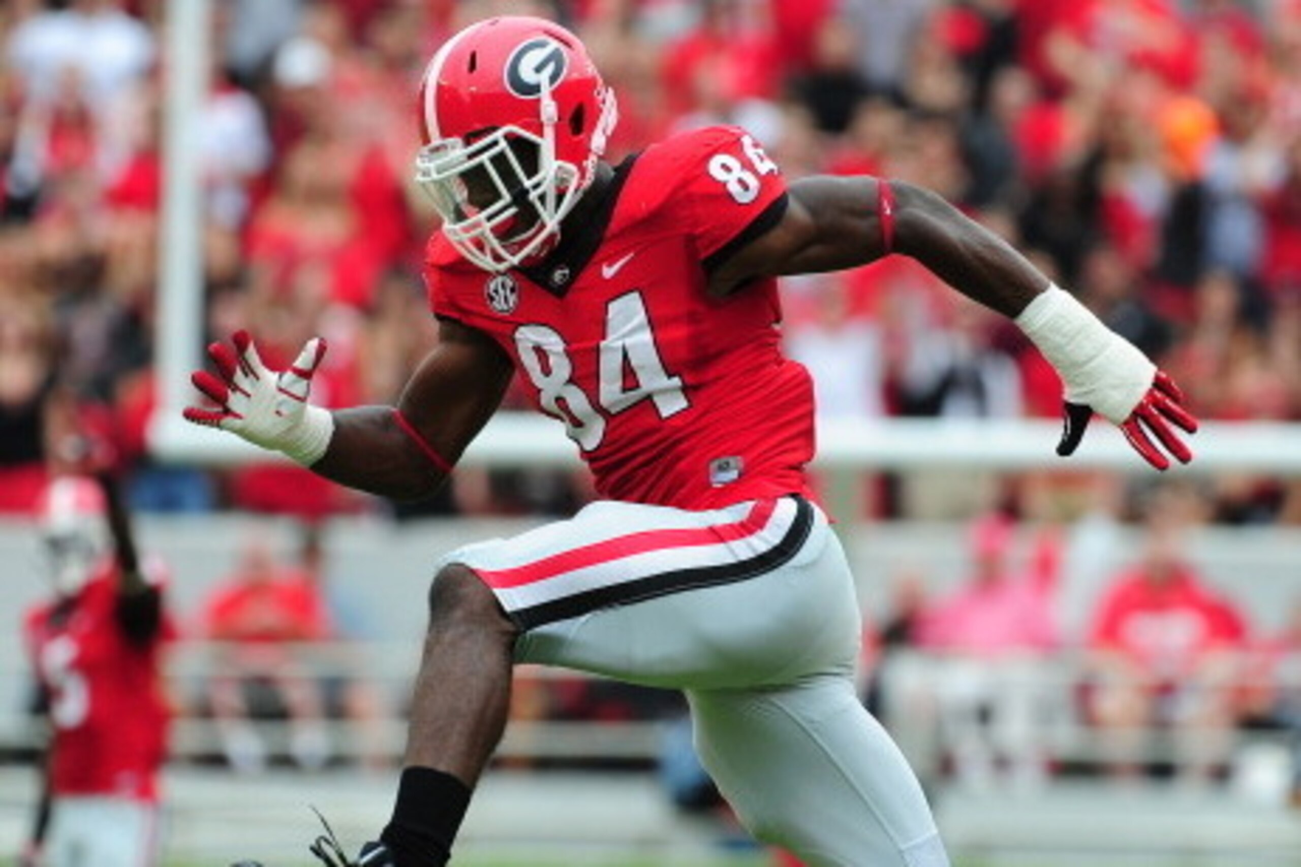 ATHENS, GA - SEPTEMBER 21: Leonard Floyd #84 of the Georgia Bulldogs celebrates after making a tackle against the North Texas Mean Green at Sanford Stadium on September 21, 2013 in Athens, Georgia. (Photo by Scott Cunningham/Getty Images)