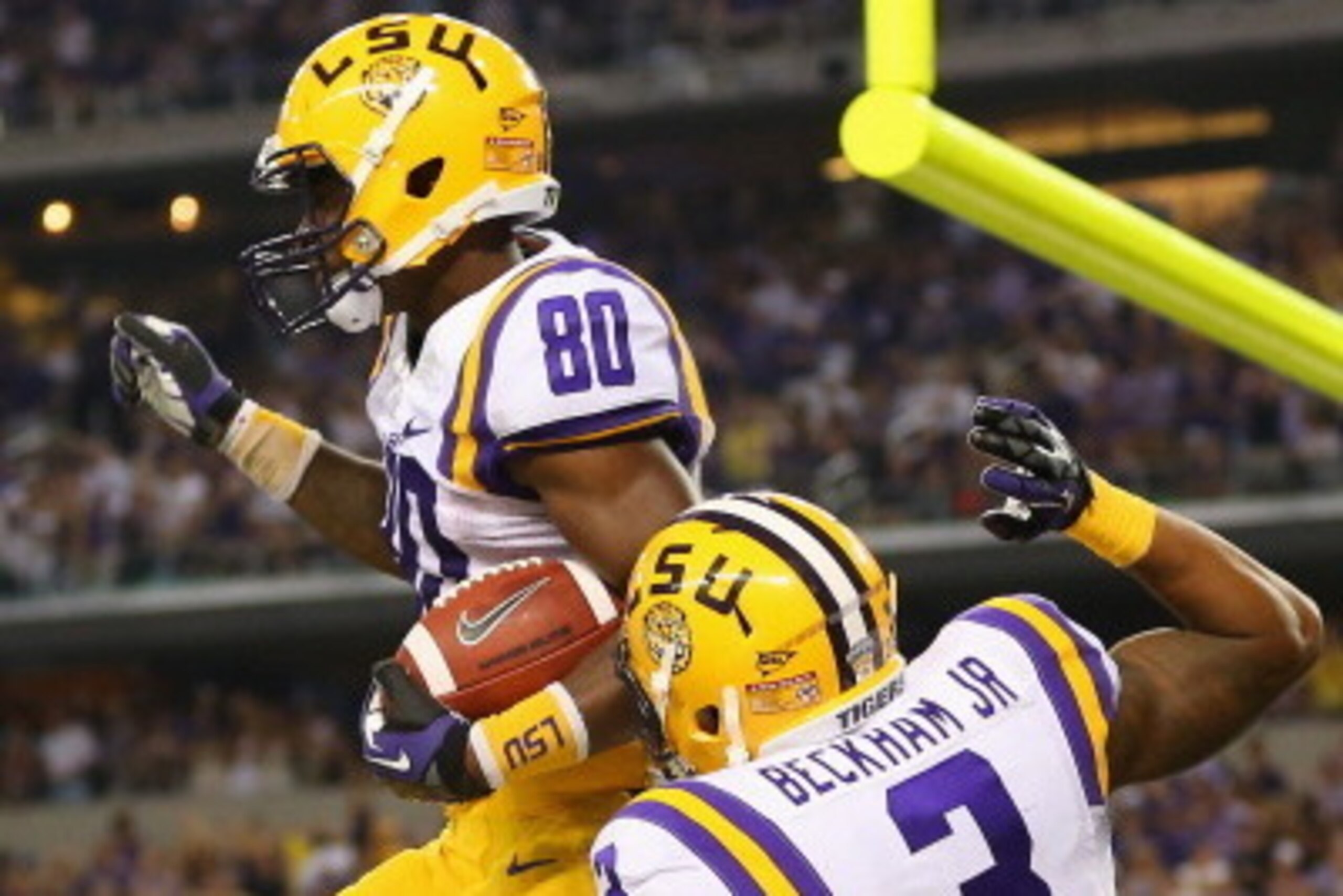 ARLINGTON, TX - AUGUST 31:  Jarvis Landry #80 of the LSU Tigers celebrates his touchdown with Odell Beckham Jr. #3 against the TCU Horned Frogs at AT&T Stadium on August 31, 2013 in Arlington, Texas.  (Photo by Ronald Martinez/Getty Images)