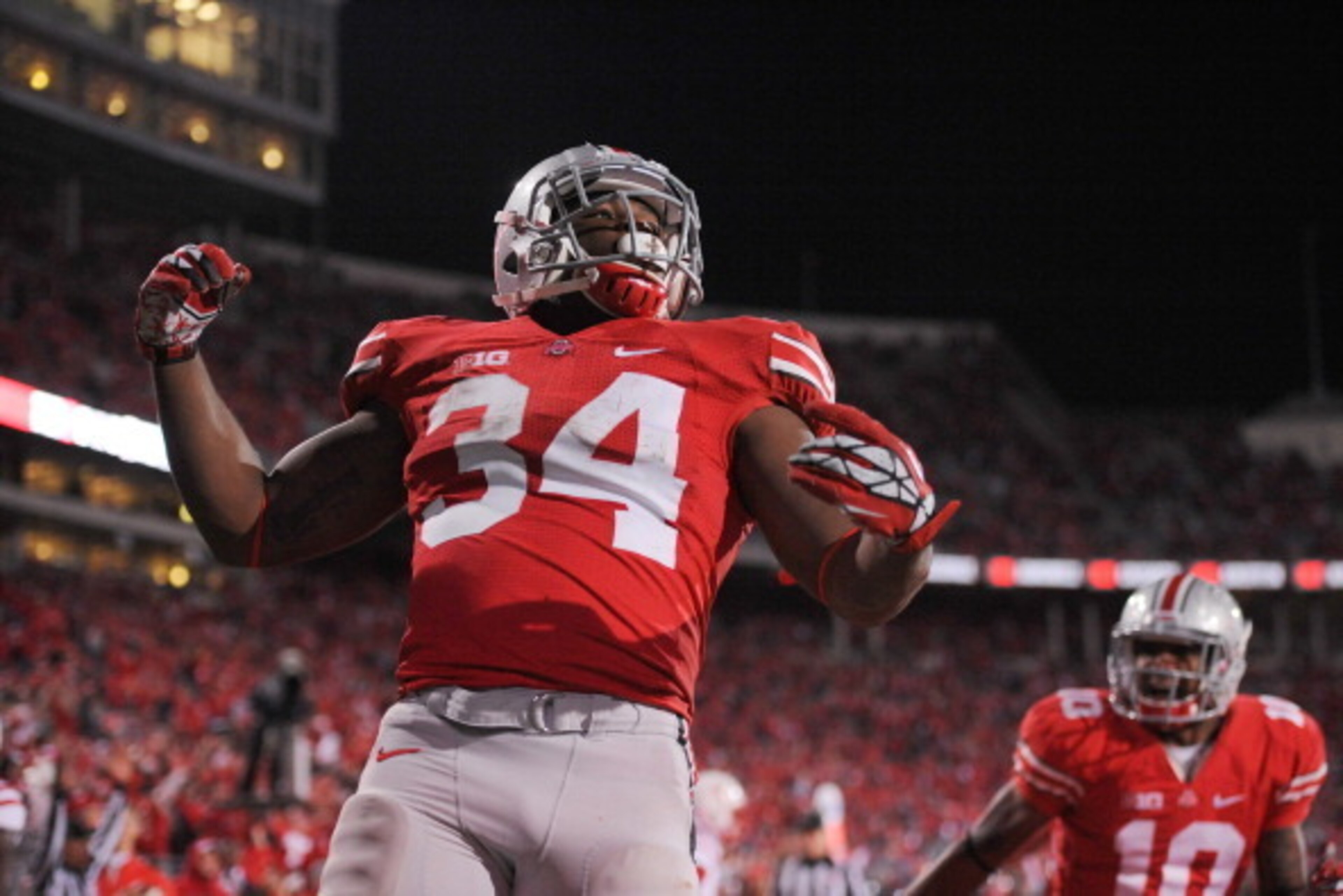 COLUMBUS, OH - OCTOBER 6:  Carlos Hyde #34 of the Ohio State Buckeyes celebrates his fourth touchdown of the game against the Nebraska Cornhuskers with less than a minute to play in the game at Ohio Stadium on October 6, 2012 in Columbus, Ohio. Ohio State