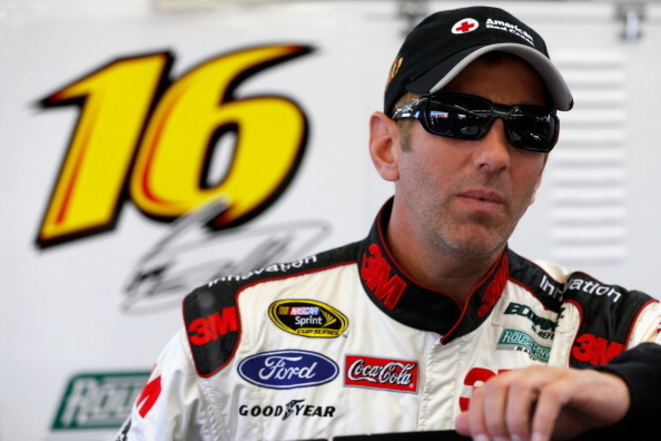 LAS VEGAS, NV - MARCH 08:  Greg Biffle, driver of the #16 Red Cross Ford, stands in the garage area during practice for the NASCAR Sprint Cup Series Kobalt 400 at Las Vegas Motor Speedway on March 8, 2014 in Las Vegas, Nevada.  (Photo by Jonathan Ferrey/G