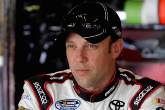 FORT WORTH, TX - APRIL 03:  Matt Kenseth, driver of the #20 GameStop Toyota, stands in the garage area during practice for the NASCAR Nationwide Series O'Reilly Auto Parts 300 at Texas Motor Speedway on April 3, 2014 in Fort Worth, Texas.  (Photo by Jerry