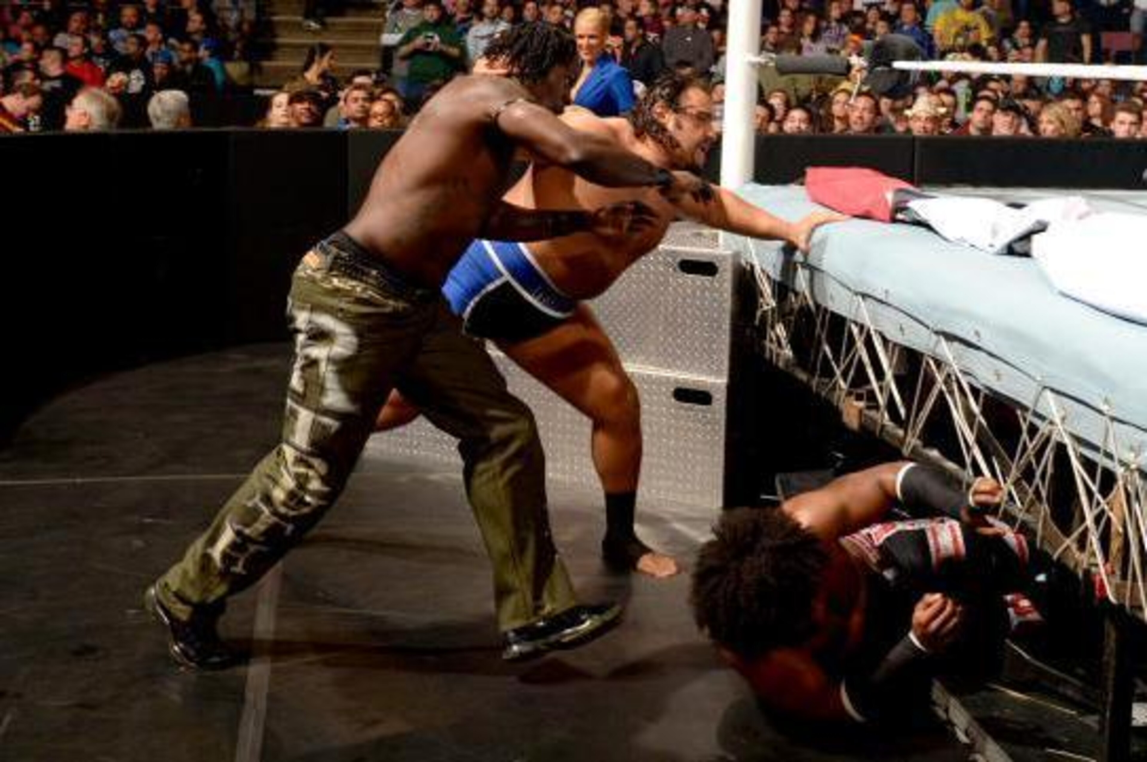 Rusev takes on R-Truth and Woods at Extreme Rules.