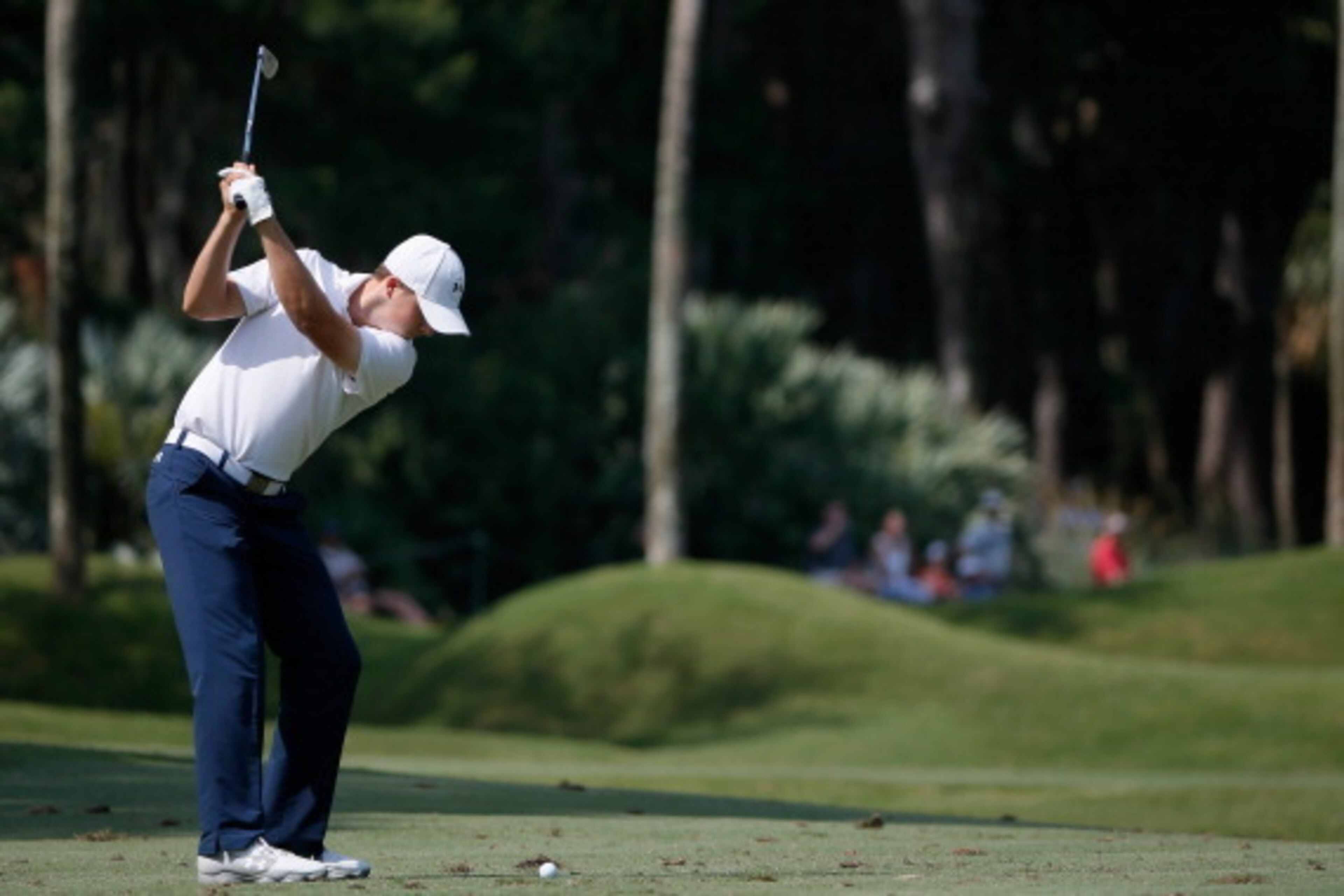 PONTE VEDRA BEACH, FL - MAY 09:  Jordan Spieth of the United States hits his approach shot on the tenth hole during the second round of THE PLAYERS Championship on The Stadium Course at TPC Sawgrass on May 9, 2014 in Ponte Vedra Beach, Florida.  (Photo by