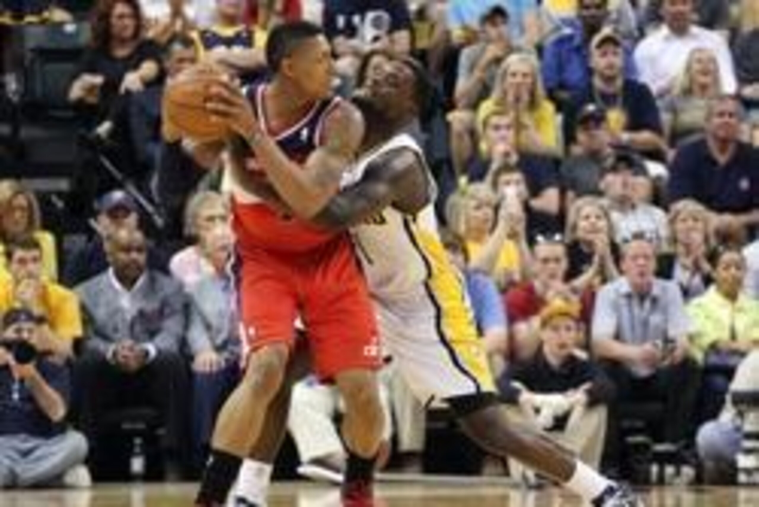 May 7, 2014; Indianapolis, IN, USA; Washington Wizards guard Bradley Beal (3) is guarded by Indiana Pacers guard Lance Stephenson (1) in game two of the second round of the 2014 NBA Playoffs at Bankers Life Fieldhouse.  Indiana defeats Washington 86-82. M