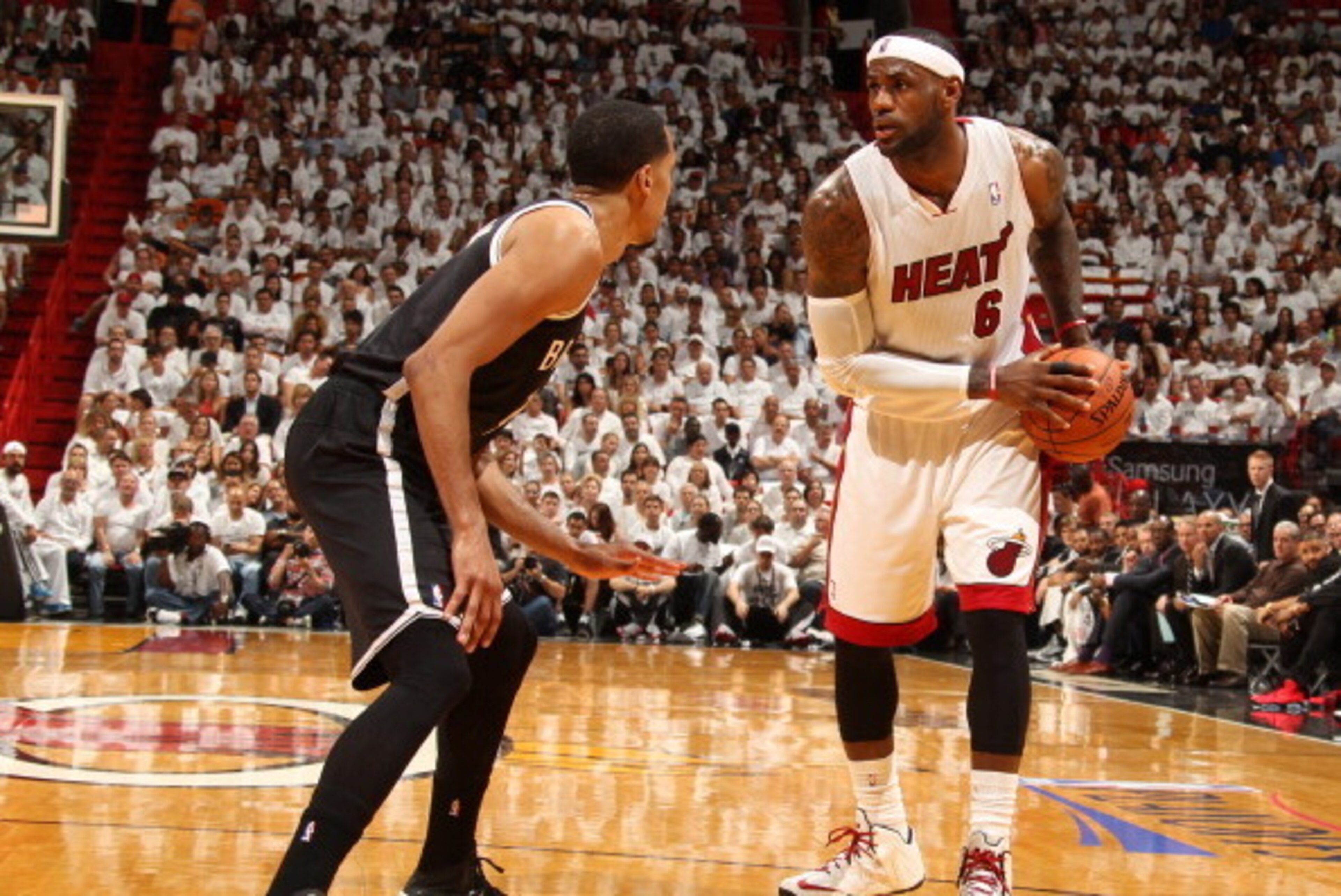 MIAMI, FL - May 8: LeBron James #6 of the Miami Heat handles the ball against the Brooklyn Nets in Game Two of the Eastern Conference Semifinals of the 2014 NBA playoffs at the American Airlines Arena in Miami, Florida on May 8, 2014. NOTE TO USER: User e