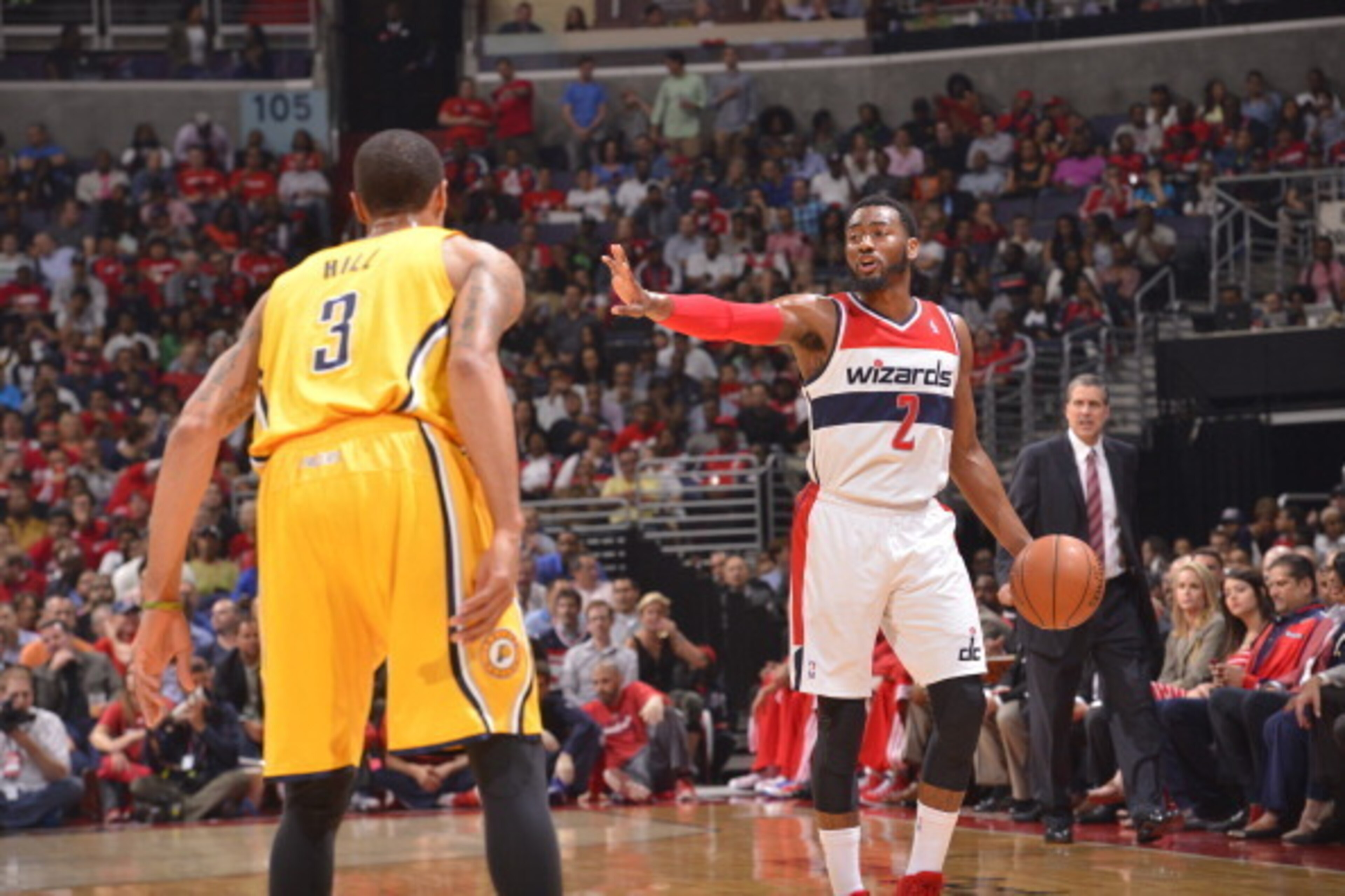 WASHINGTON, DC - MAY 09: John Wall #2 of the Washington Wizards dribbles the ball against George Hill #3 of the Indiana Pacers during Game Three of the Eastern Conference Semifinals at Verizon Center on May 9, 2014 in Washington, DC. NOTE TO USER: User ex