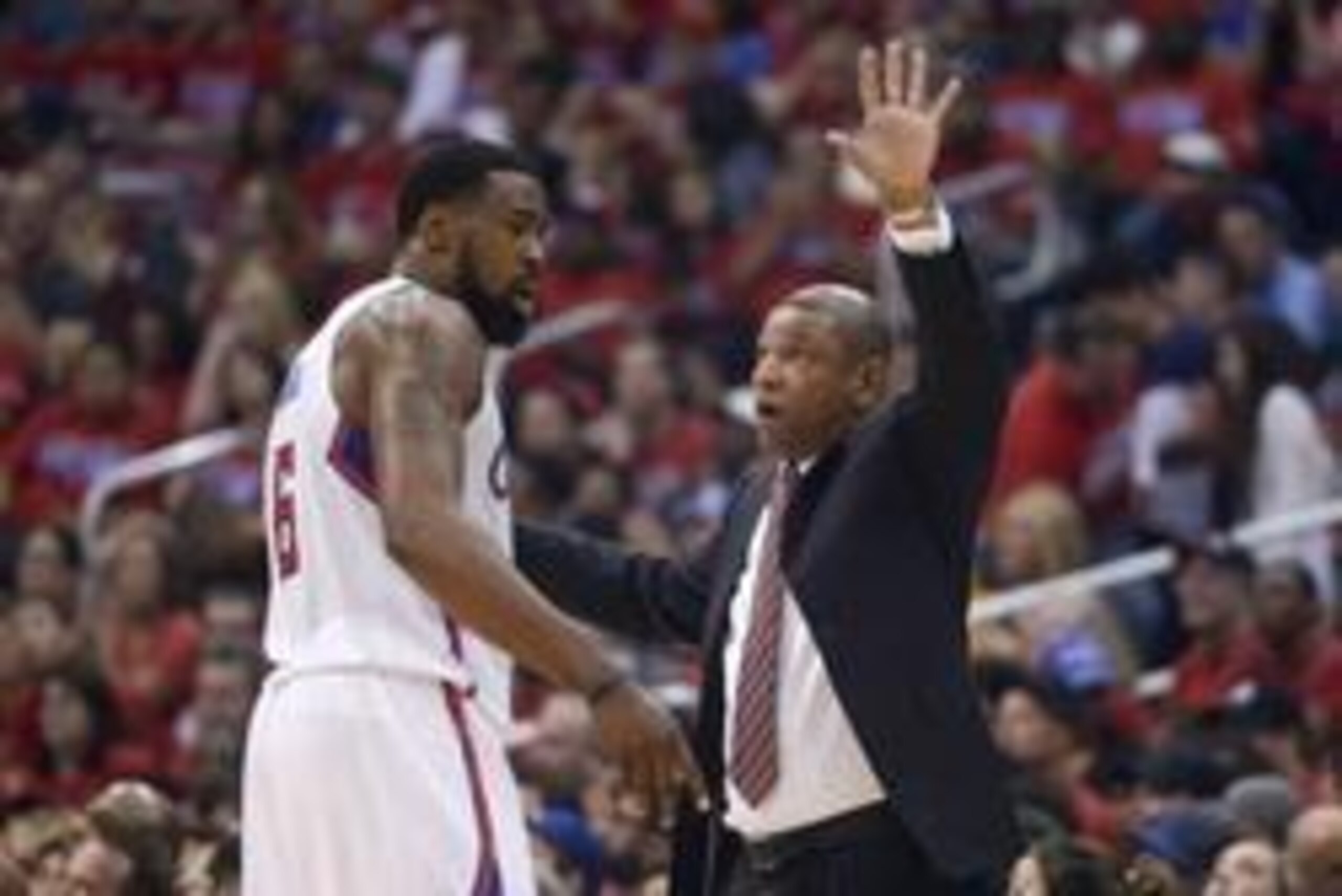 May 3, 2014; Los Angeles, CA, USA; Los Angeles Clippers coach Doc Rivers (right) and center DeAndre Jordan (6) react in the second quarter against the Golden State Warriors in game seven of the first round of the 2014 NBA Playoffs at Staples Center. Manda