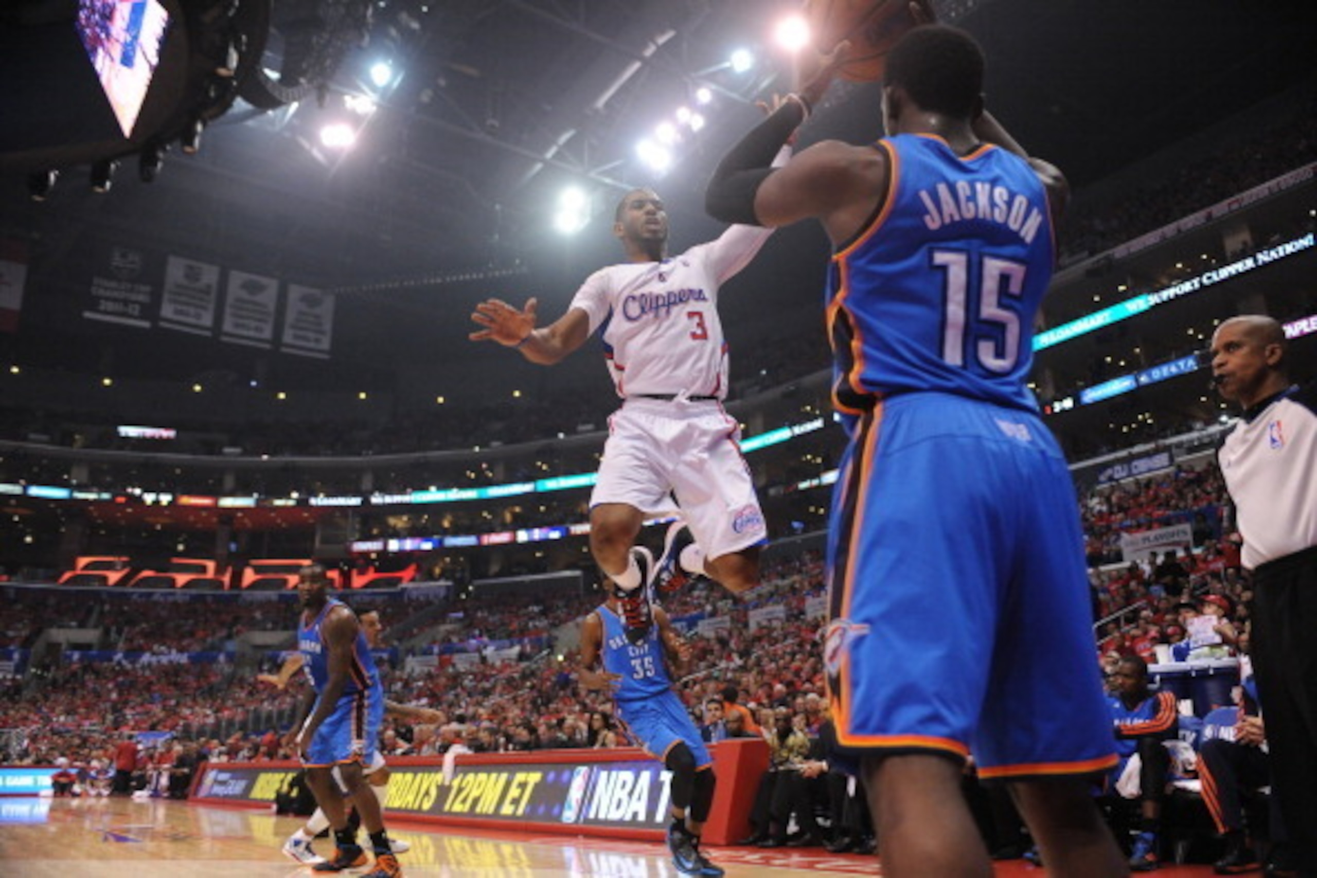 LOS ANGELES, CA - MAY 9: Chris Paul #3 of the Los Angeles Clippers defends an inbounds pass against Reggie Jackson #15 of the Oklahoma City Thunder in Game Three of the Western Conference Semifinals during the 2014 NBA Playoffs at Staples Center on May 9,