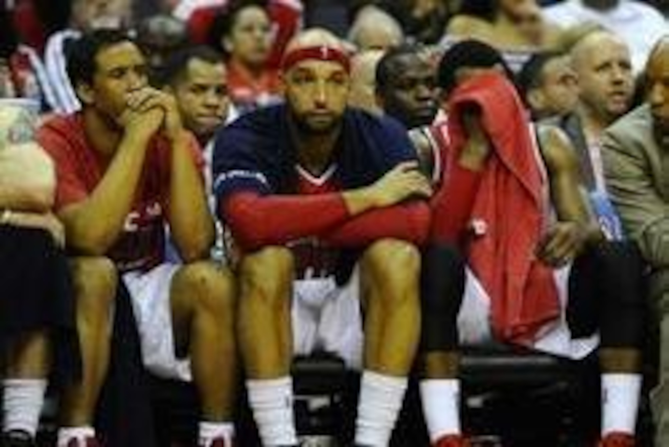 May 9, 2014; Washington, DC, USA; Washington Wizards players  Andre Miller (left) and Drew Gooden (center) and John Wall react near the end of the game against the Indiana Pacers in game three of the second round of the 2014 NBA Playoffs at Verizon Center