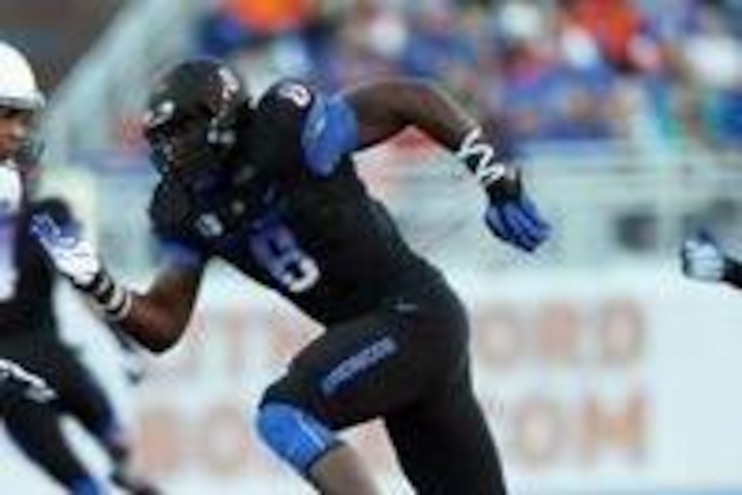 Oct 19, 2013; Boise, ID, USA; Boise State Broncos defensive end Demarcus Lawrence (8) during the game against the Nevada Wolf Pack at Bronco Stadium. Mandatory Credit: Brian Losness-USA TODAY Sports